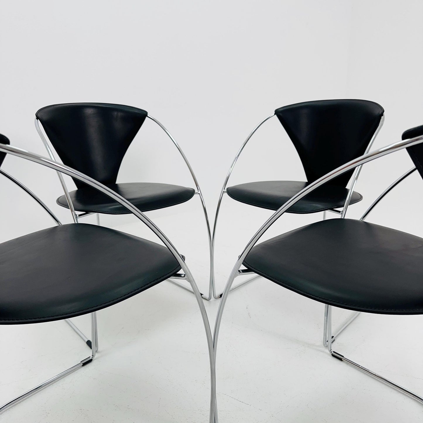 Set of 4 Mid-Century Modern Dining Armchairs by Arrben | Model Linda, Black Leather & Chrome, Italy 1980s