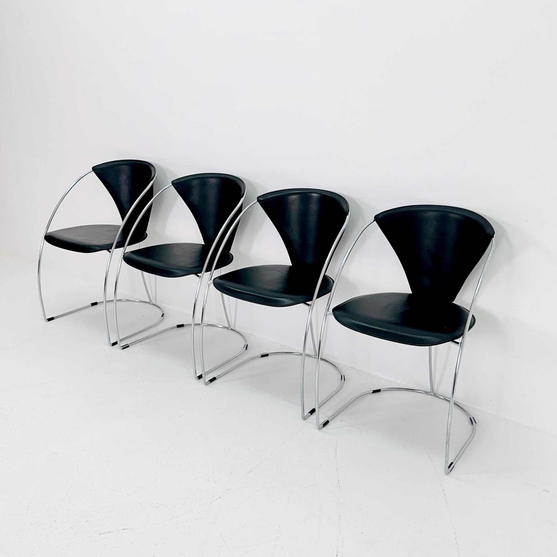 Set of 4 Mid-Century Modern Dining Armchairs by Arrben | Model Linda, Black Leather & Chrome, Italy 1980s