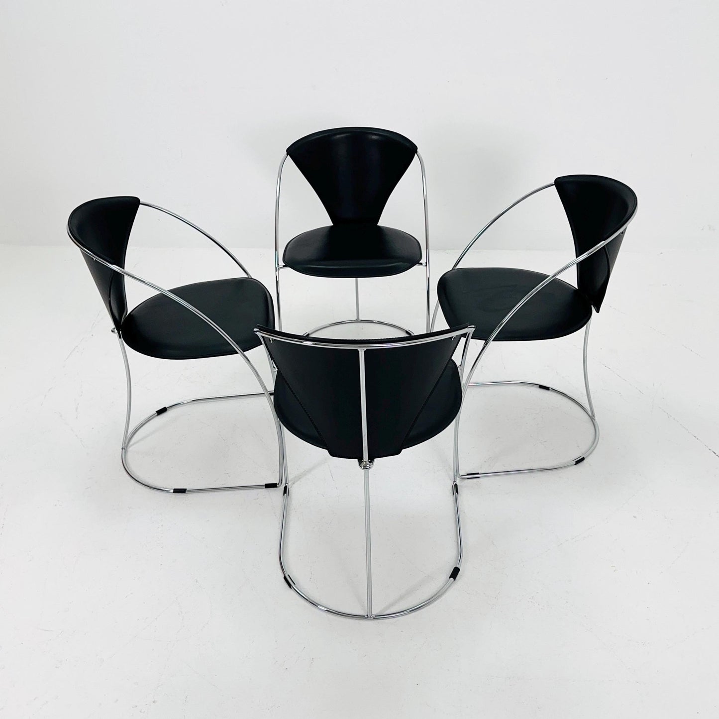 Set of 4 Mid-Century Modern Dining Armchairs by Arrben | Model Linda, Black Leather & Chrome, Italy 1980s