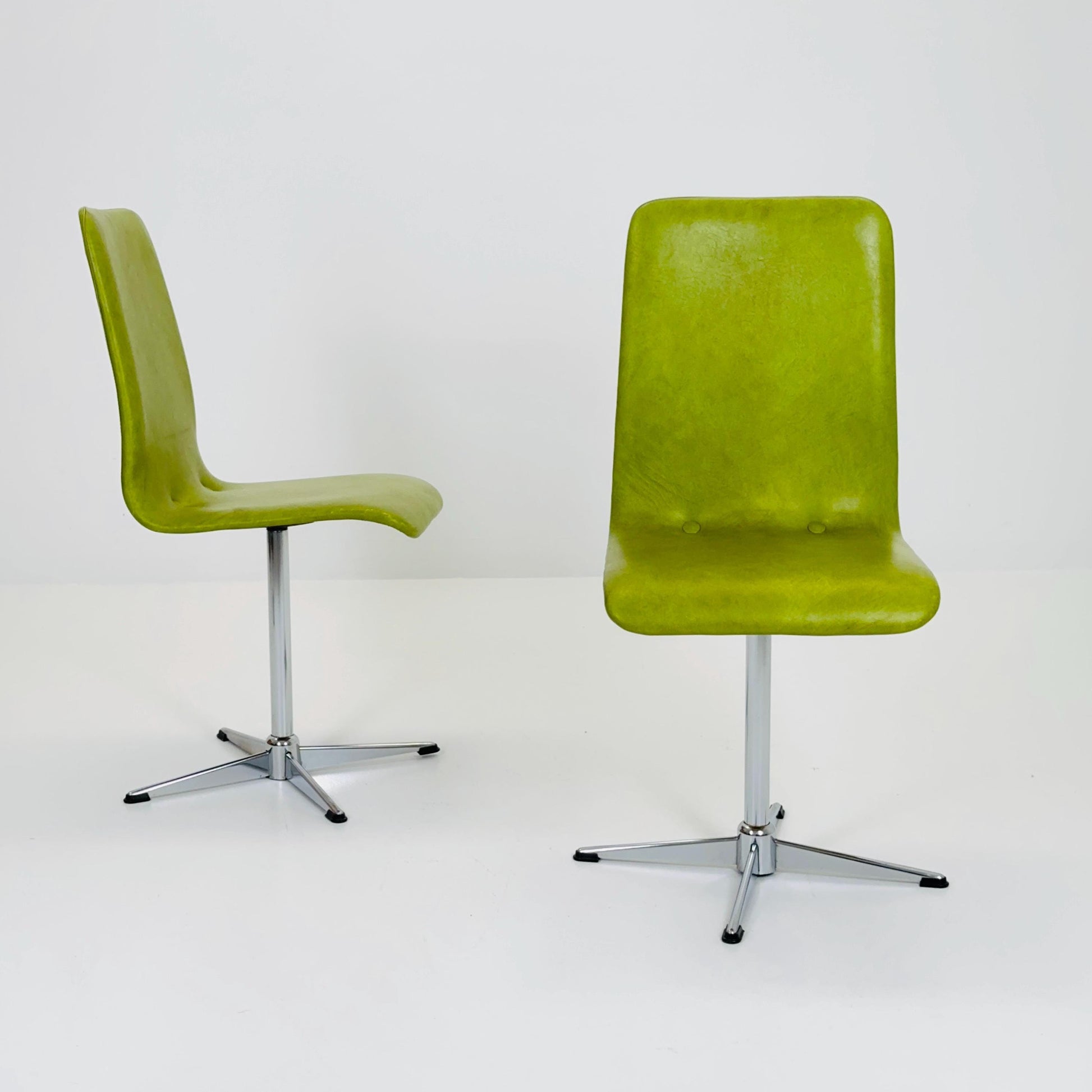 1 of 2 Bauhaus Mid-Century Lounge Swivel Chair — Chrome Base & Green faux leather — Germany, 1980s