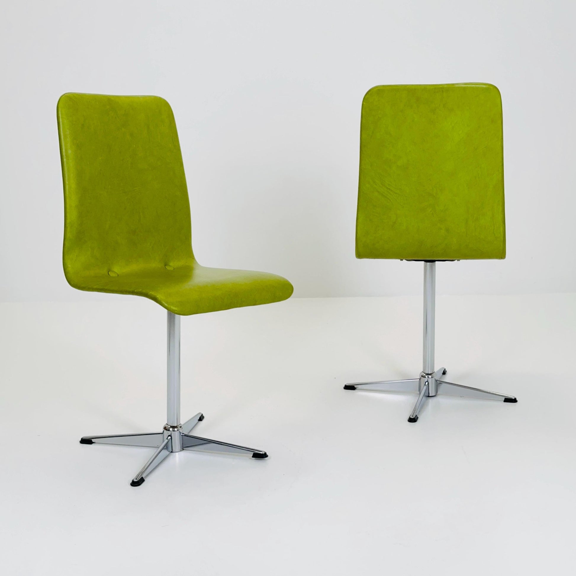 1 of 2 Bauhaus Mid-Century Lounge Swivel Chair — Chrome Base & Green faux leather — Germany, 1980s