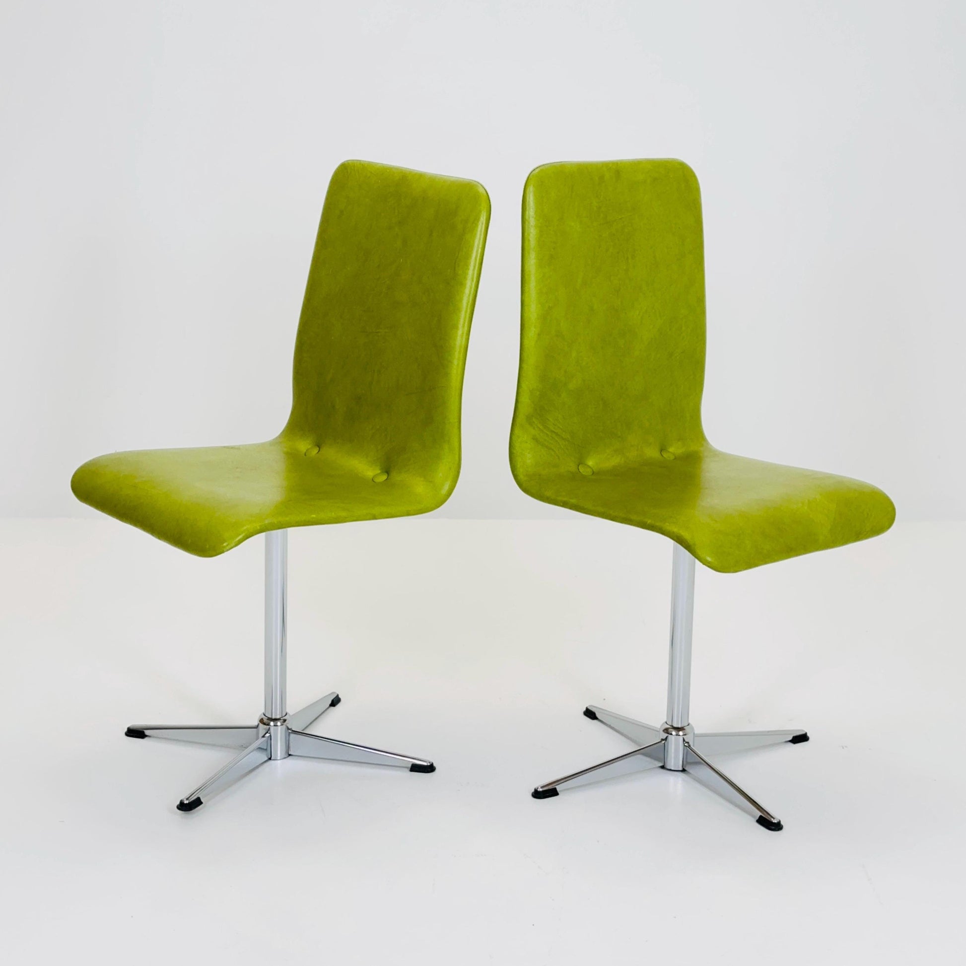 1 of 2 Bauhaus Mid-Century Lounge Swivel Chair — Chrome Base & Green faux leather — Germany, 1980s