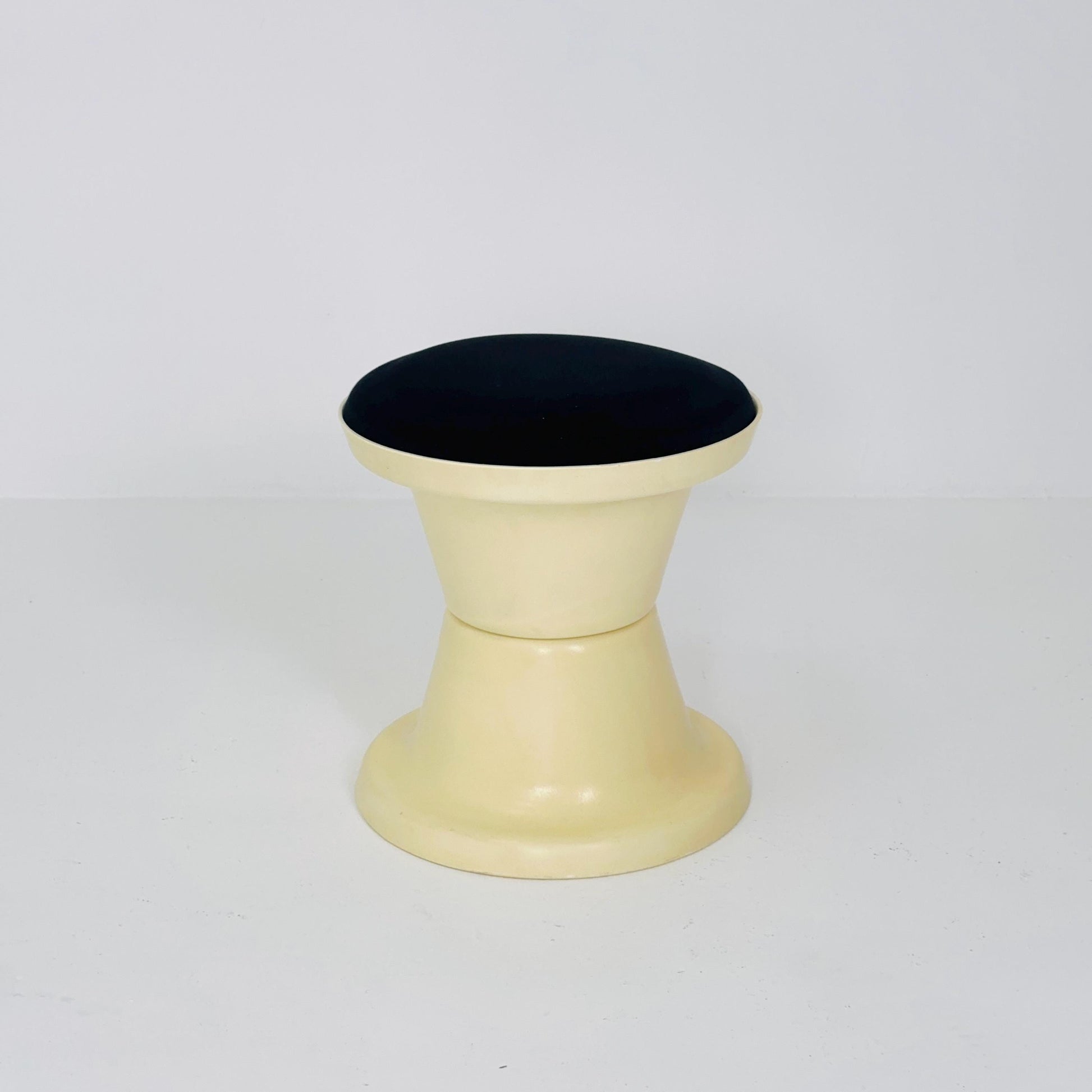 Space Age Plastic Hourglass Stool in Cream with Black Minimalist Accent Seat 1970s