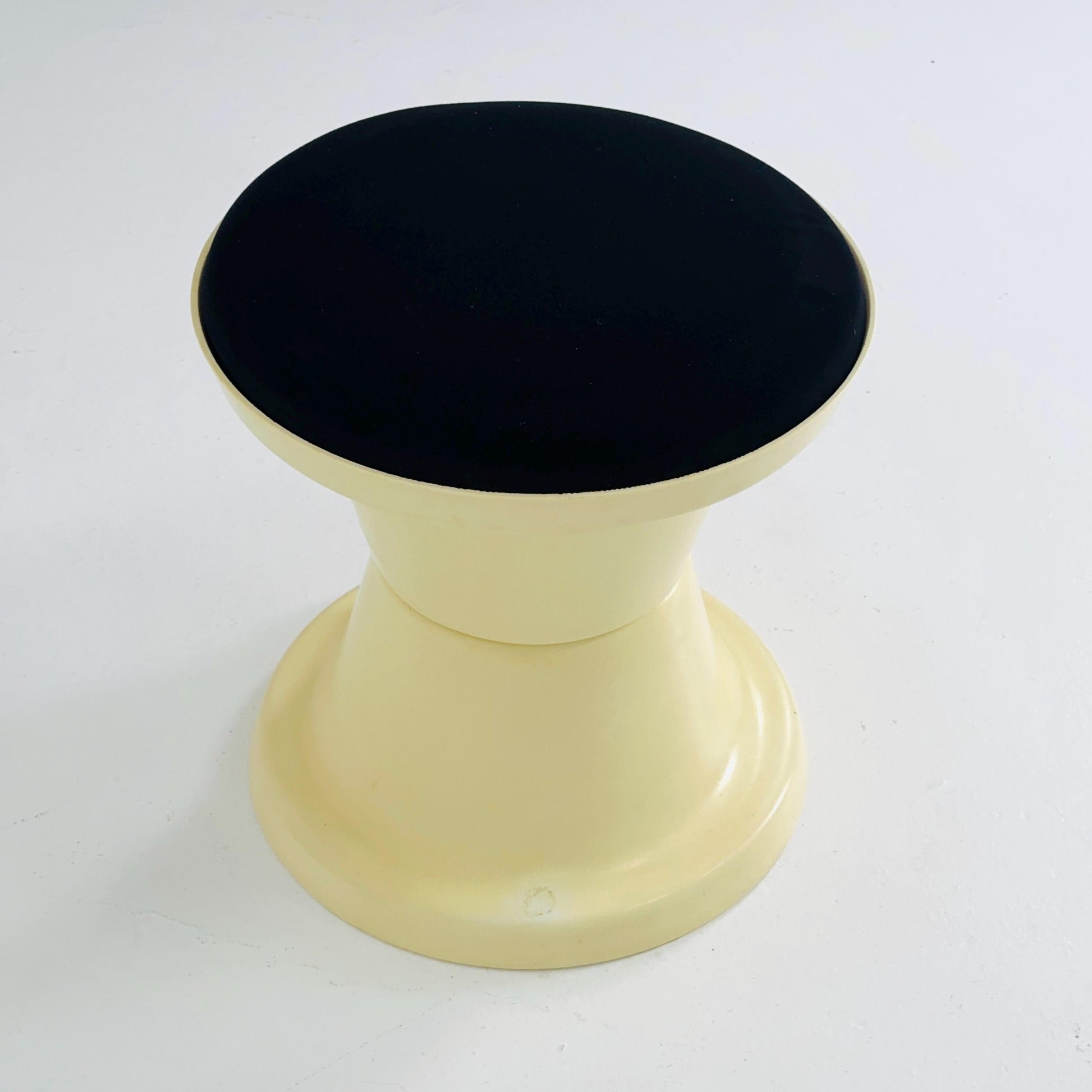Space Age Plastic Hourglass Stool in Cream with Black Minimalist Accent Seat 1970s