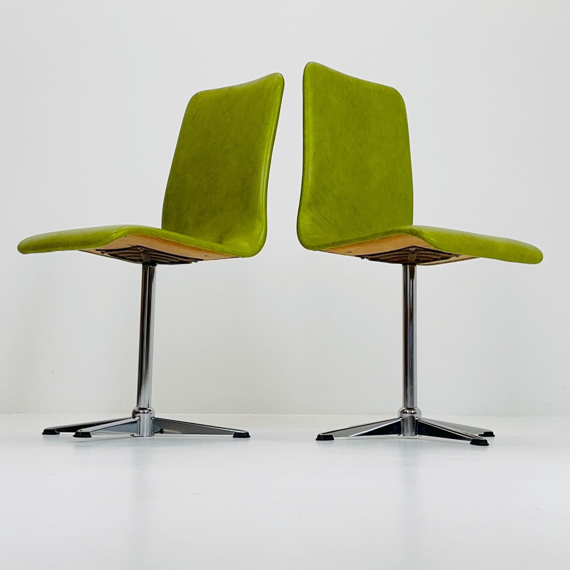 1 of 2 Bauhaus Mid-Century Lounge Swivel Chair — Chrome Base & Green faux leather — Germany, 1980s