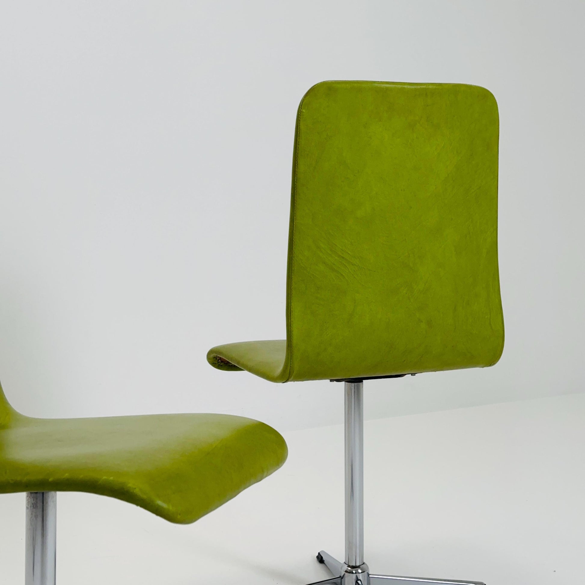 1 of 2 Bauhaus Mid-Century Lounge Swivel Chair — Chrome Base & Green faux leather — Germany, 1980s