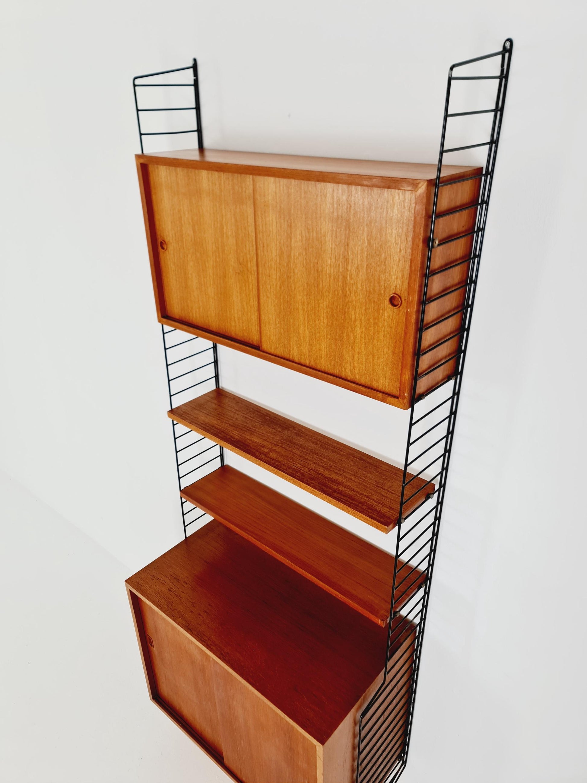Wall-mounted original Swedish string shelf-system, drawers, bookcase teak wood by Nils & Kajsa Strinning, 1960s
