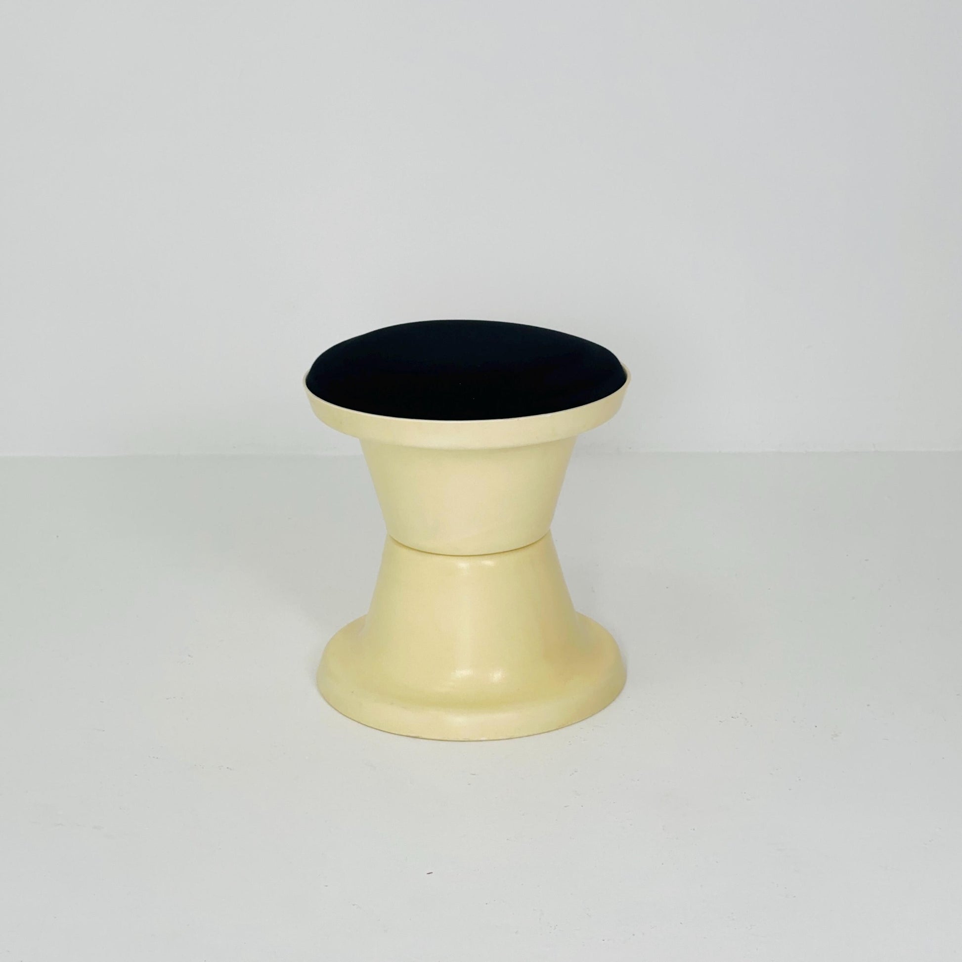 Space Age Plastic Hourglass Stool in Cream with Black Minimalist Accent Seat 1970s
