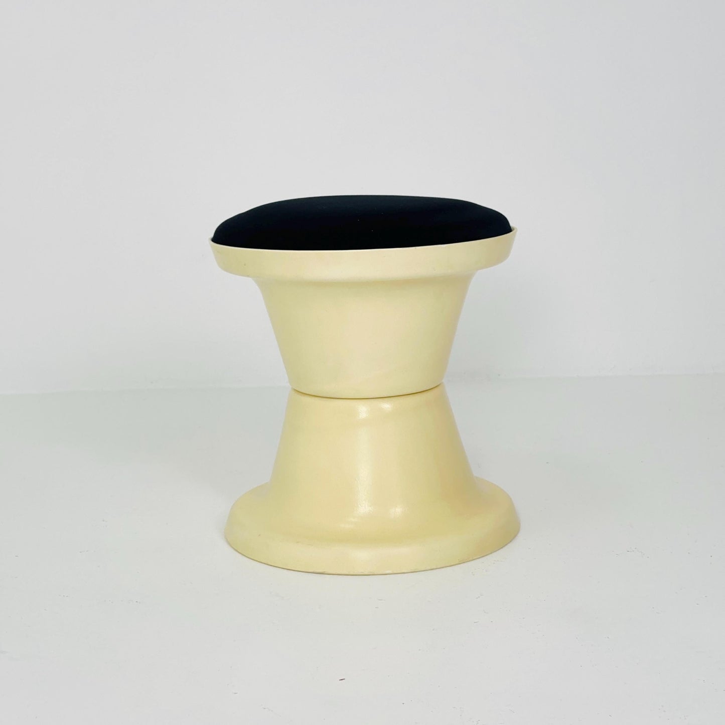 Space Age Plastic Hourglass Stool in Cream with Black Minimalist Accent Seat 1970s