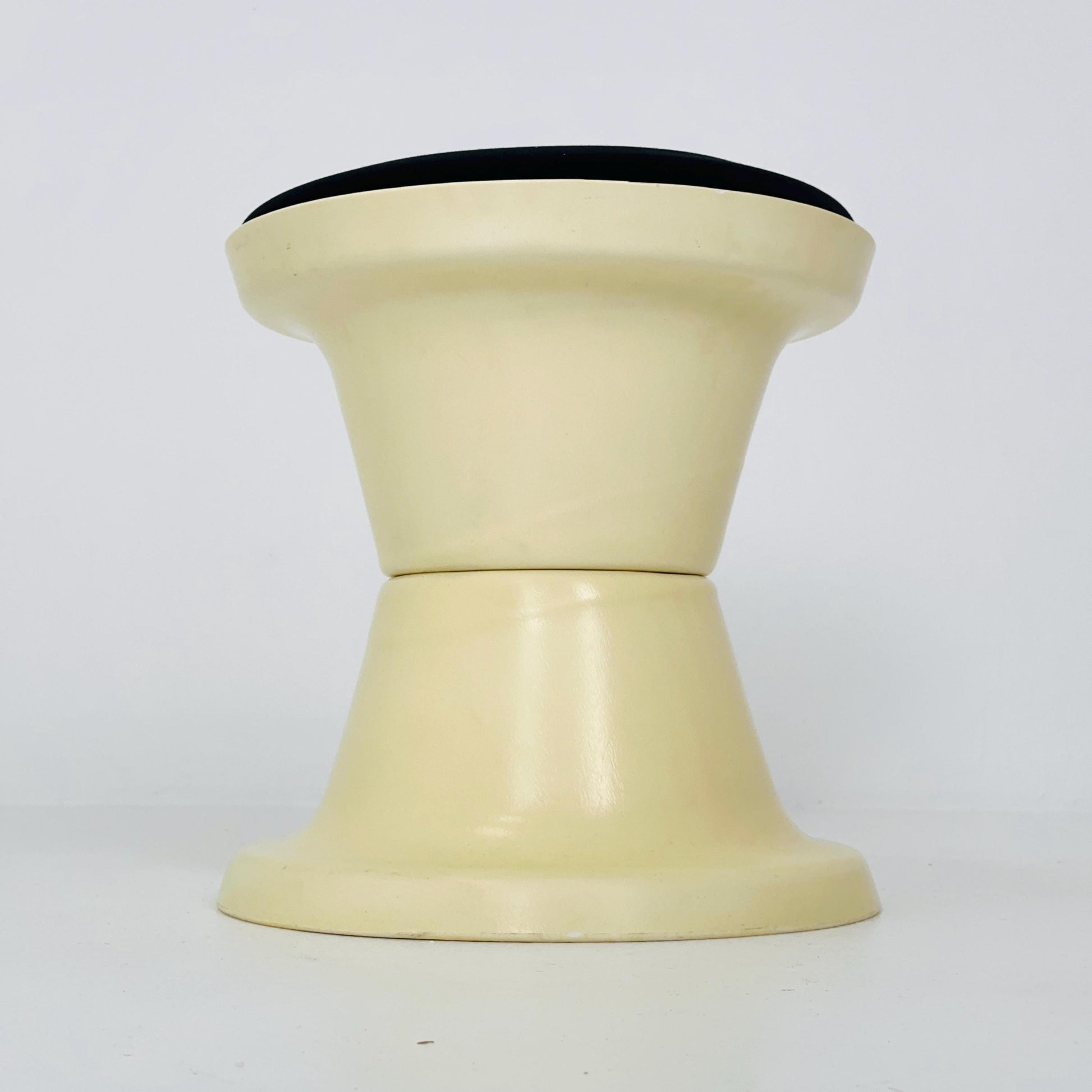 Space Age Plastic Hourglass Stool in Cream with Black Minimalist Accent Seat 1970s