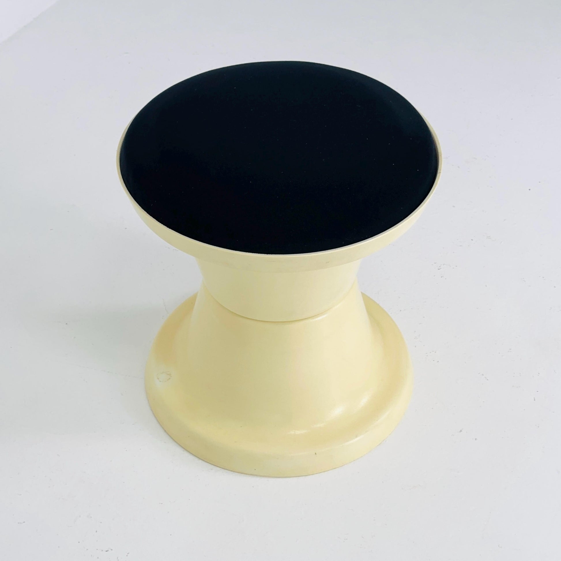 Space Age Plastic Hourglass Stool in Cream with Black Minimalist Accent Seat 1970s