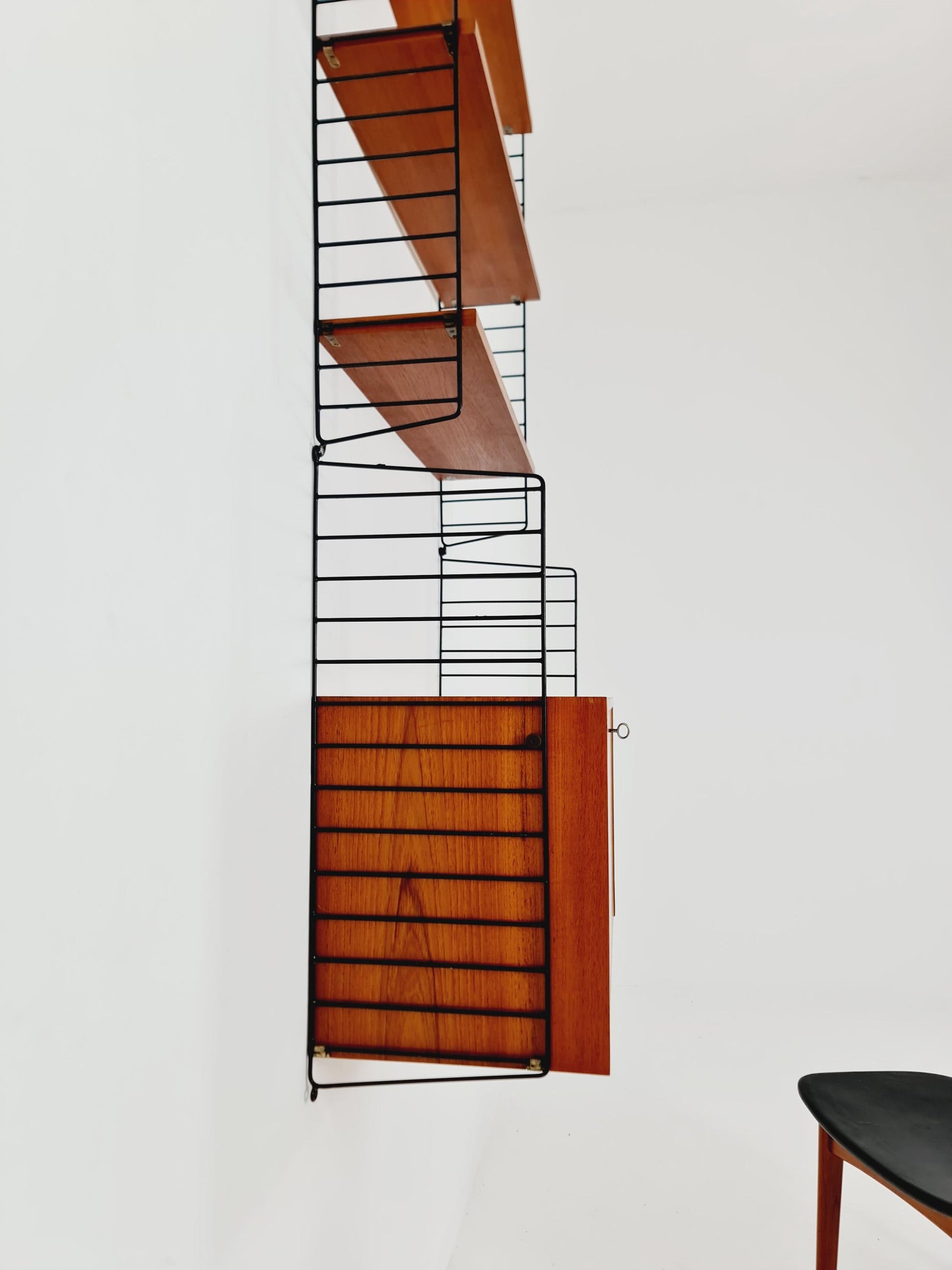 Wall-mounted original Swedish string shelf-system, bookcase teak wood by Nils & Kajsa Strinning, 1960s