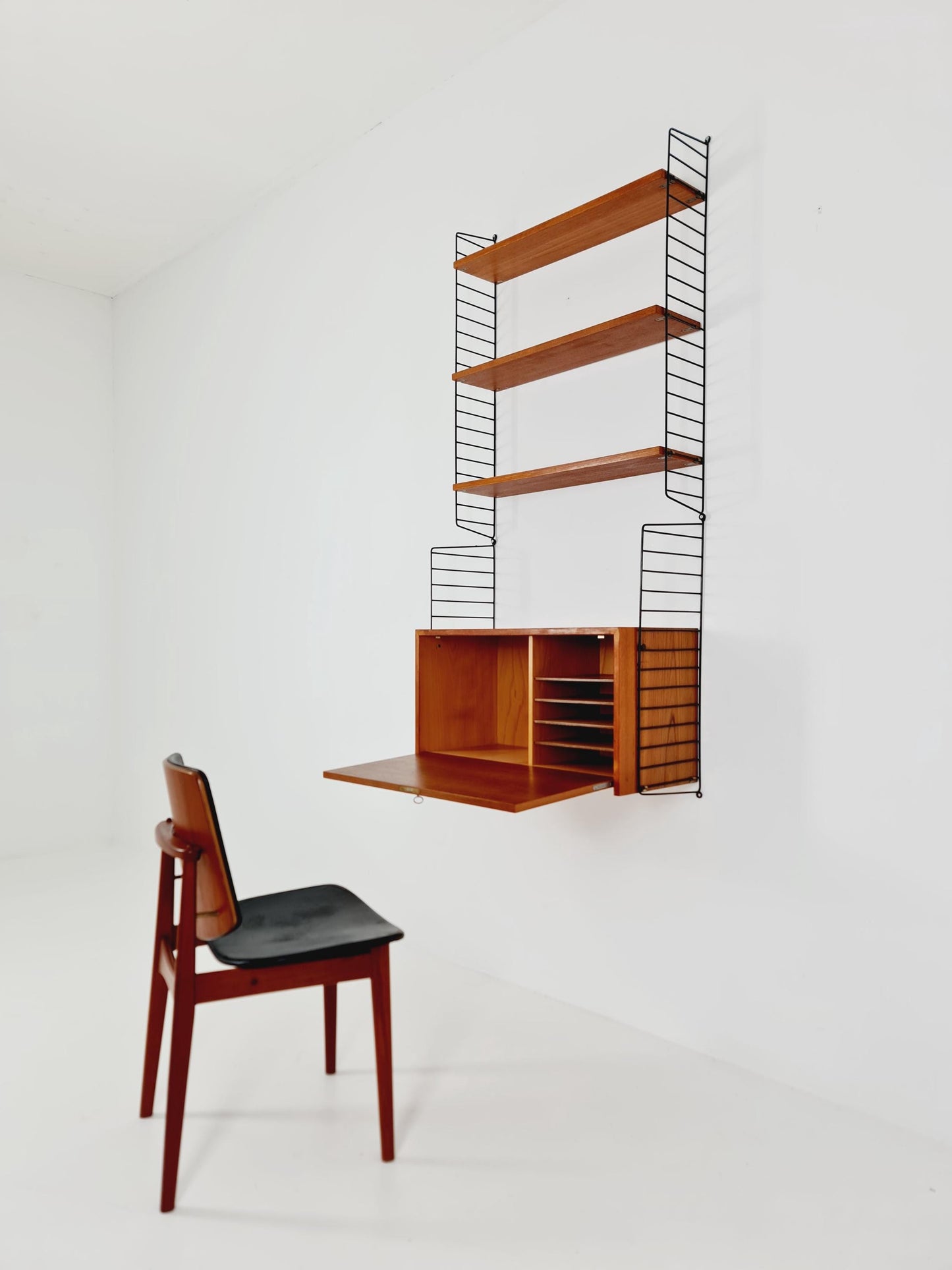 Wall-mounted original Swedish string shelf-system, bookcase teak wood by Nils & Kajsa Strinning, 1960s