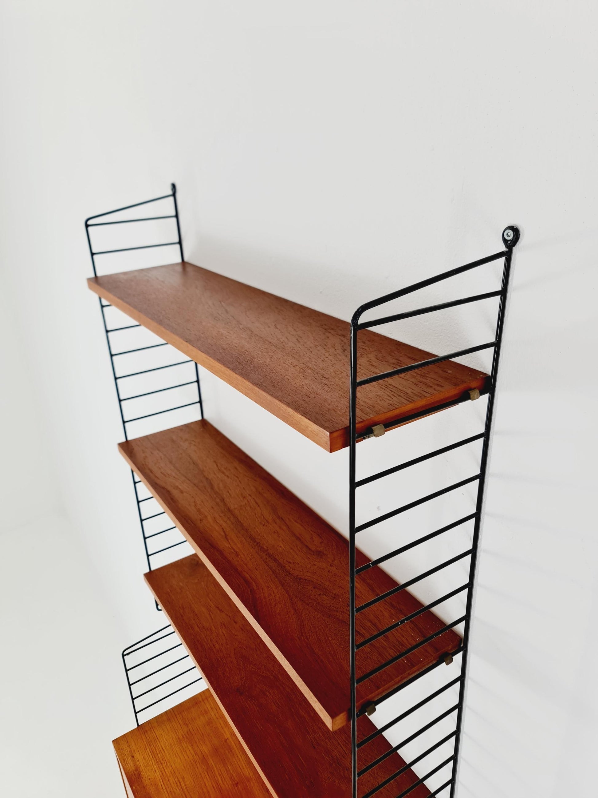 Wall-mounted original Swedish string shelf-system, bookcase teak wood by Nils & Kajsa Strinning, 1960s