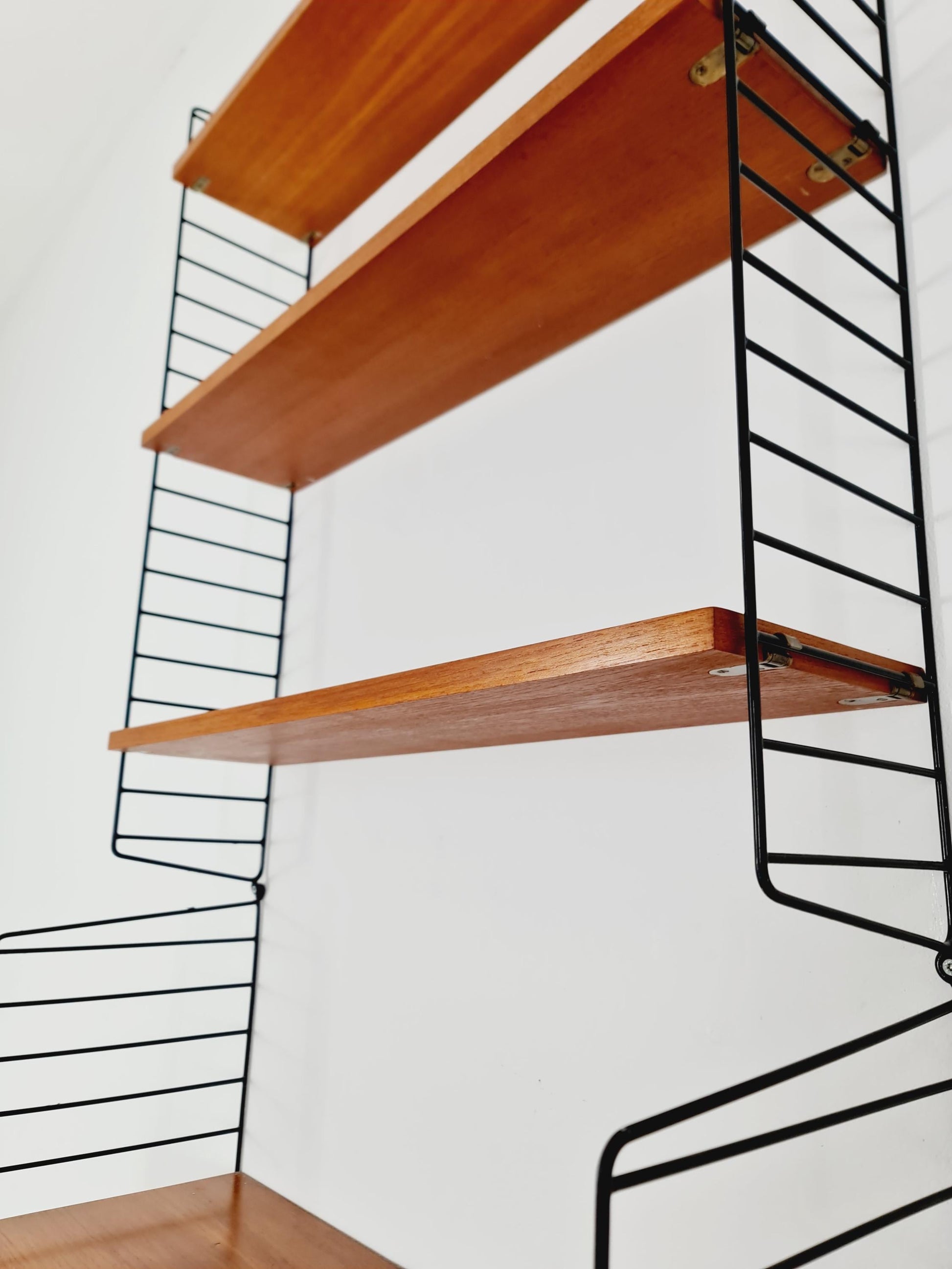 Wall-mounted original Swedish string shelf-system, bookcase teak wood by Nils & Kajsa Strinning, 1960s