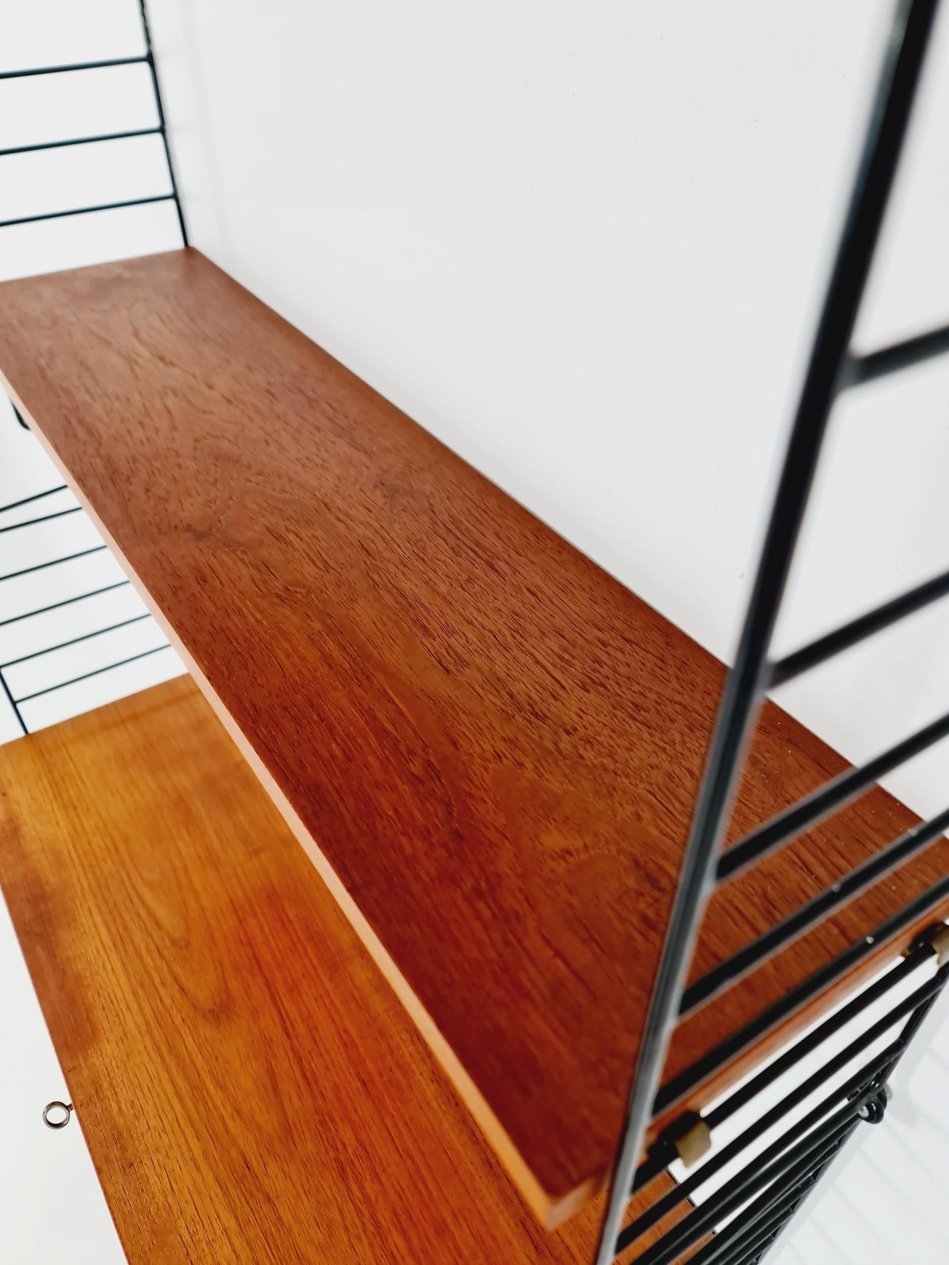 Wall-mounted original Swedish string shelf-system, bookcase teak wood by Nils & Kajsa Strinning, 1960s