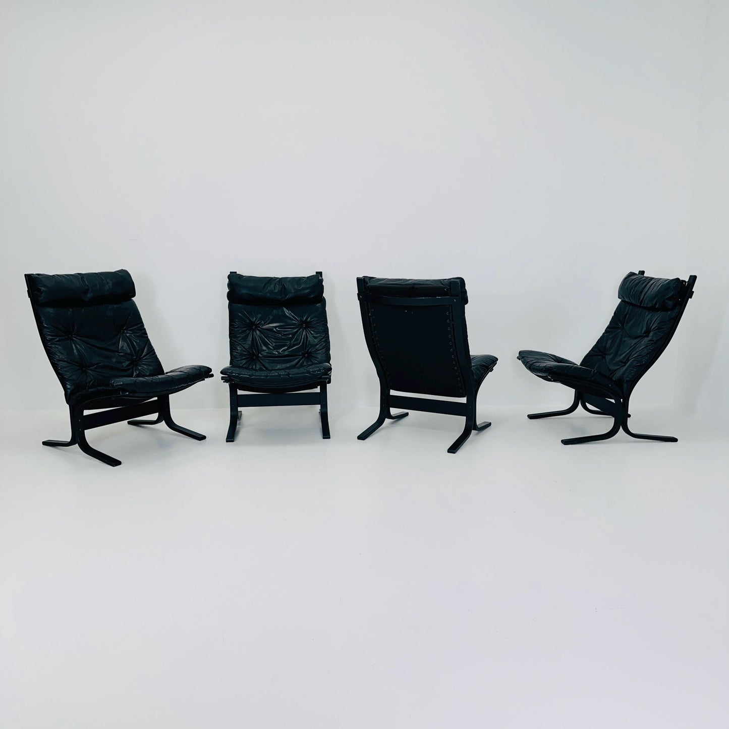Set of 4 Mid Century “Siesta” lounge chair by Ingmar Relling, Westnofa Furniture, Norway — Full Black Edition, Leather & Wooden Frame, 1960s