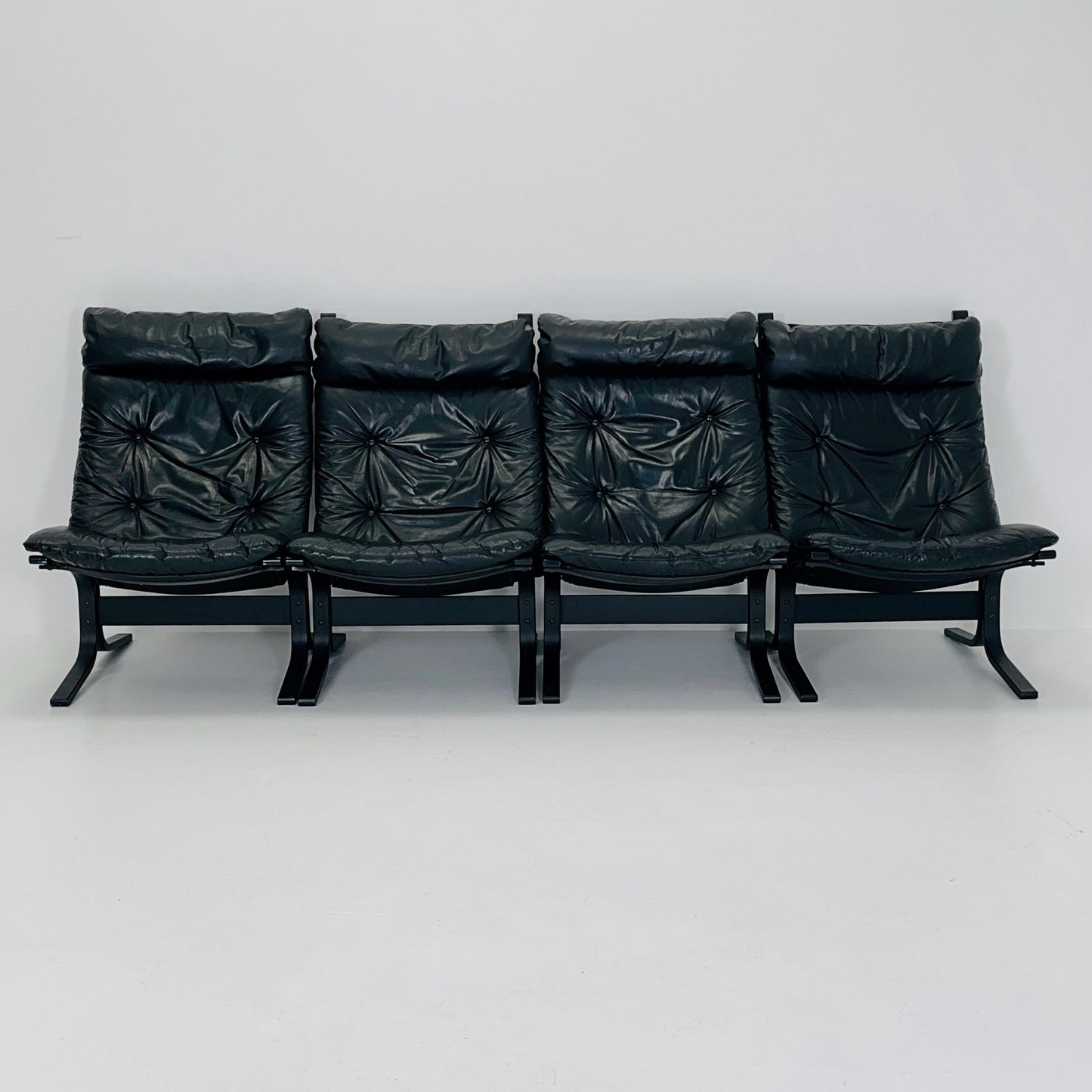 Set of 4 Mid Century “Siesta” lounge chair by Ingmar Relling, Westnofa Furniture, Norway — Full Black Edition, Leather & Wooden Frame, 1960s