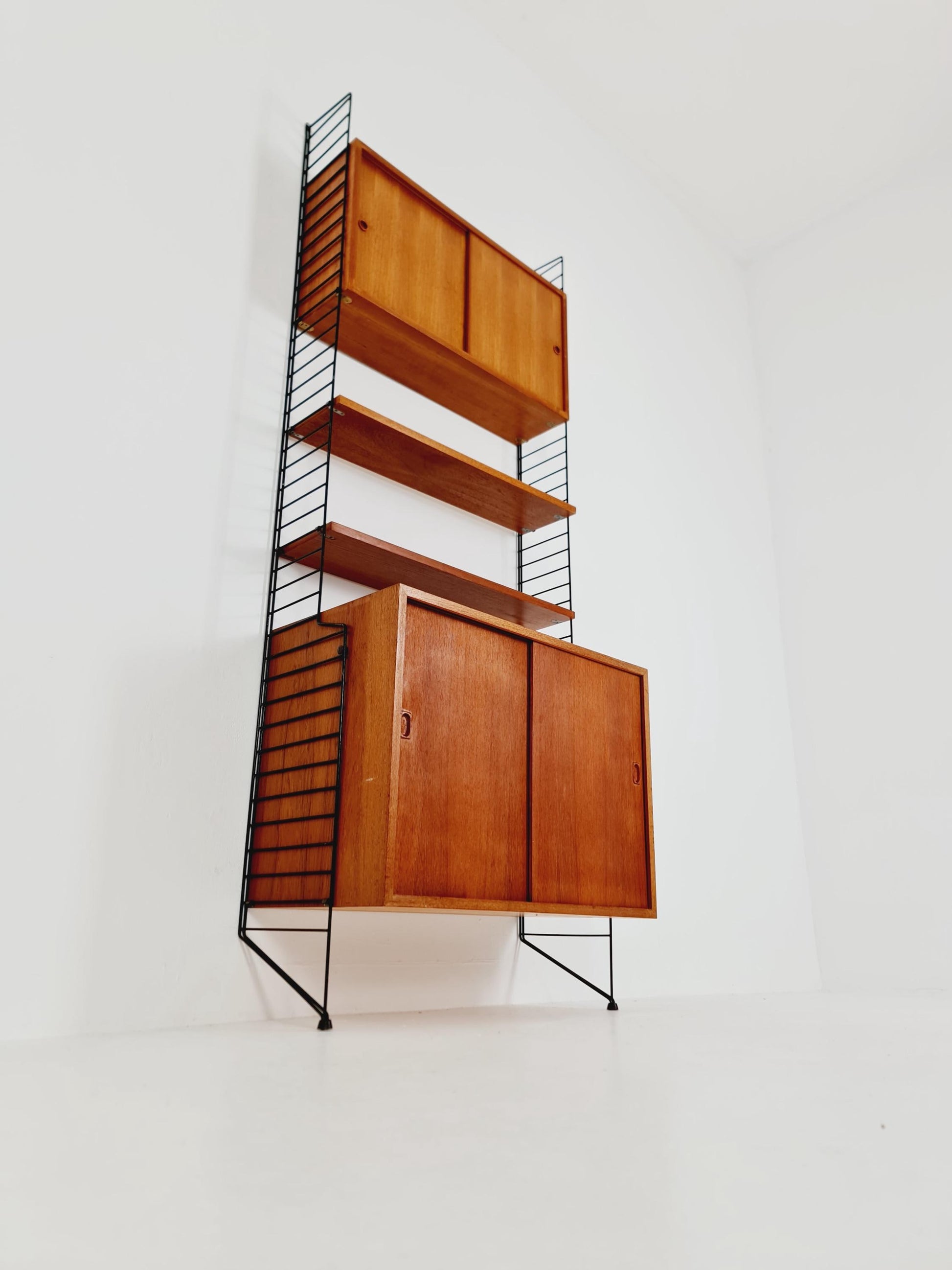 Wall-mounted original Swedish string shelf-system, drawers, bookcase teak wood by Nils & Kajsa Strinning, 1960s