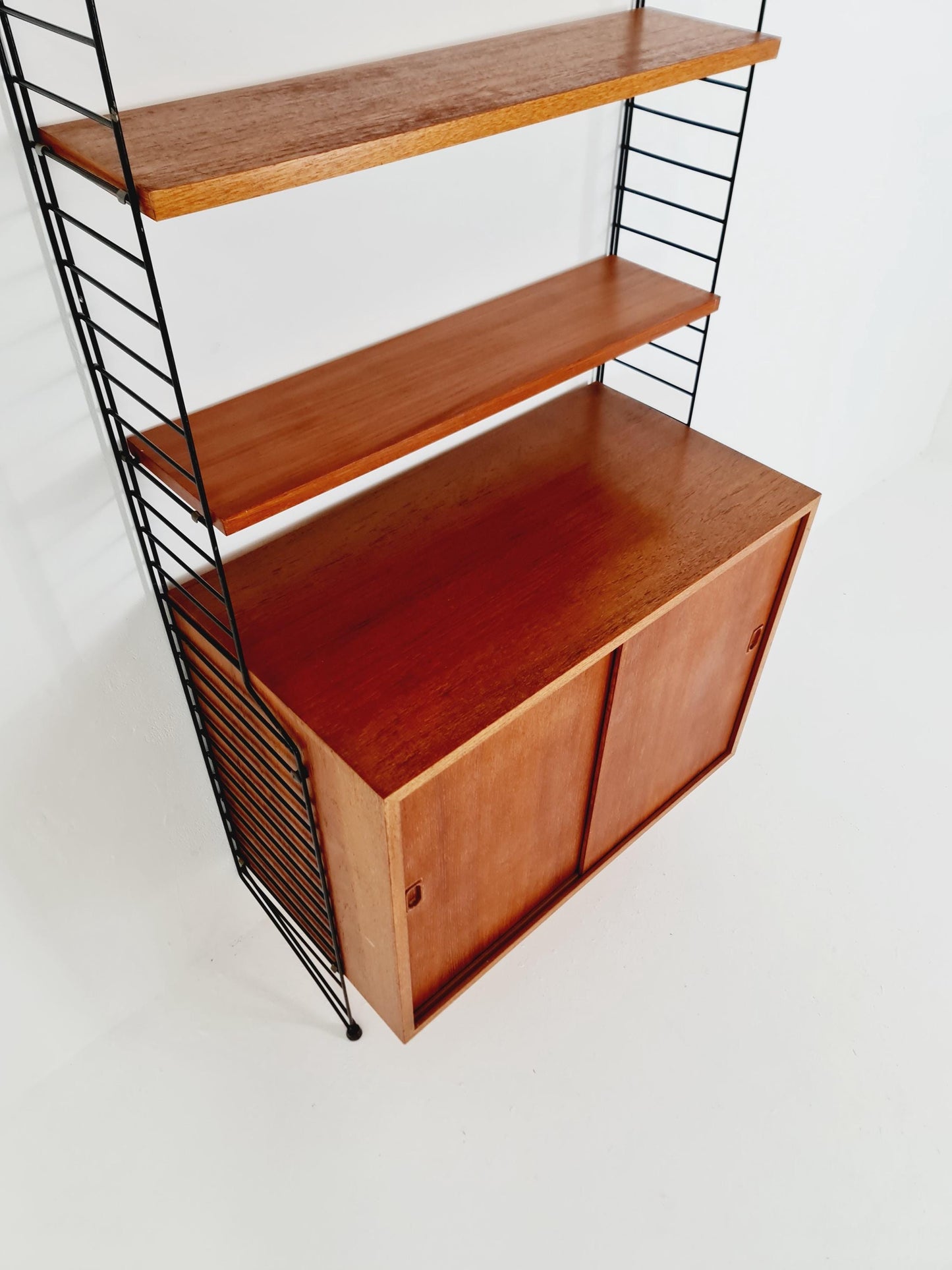 Wall-mounted original Swedish string shelf-system, drawers, bookcase teak wood by Nils & Kajsa Strinning, 1960s