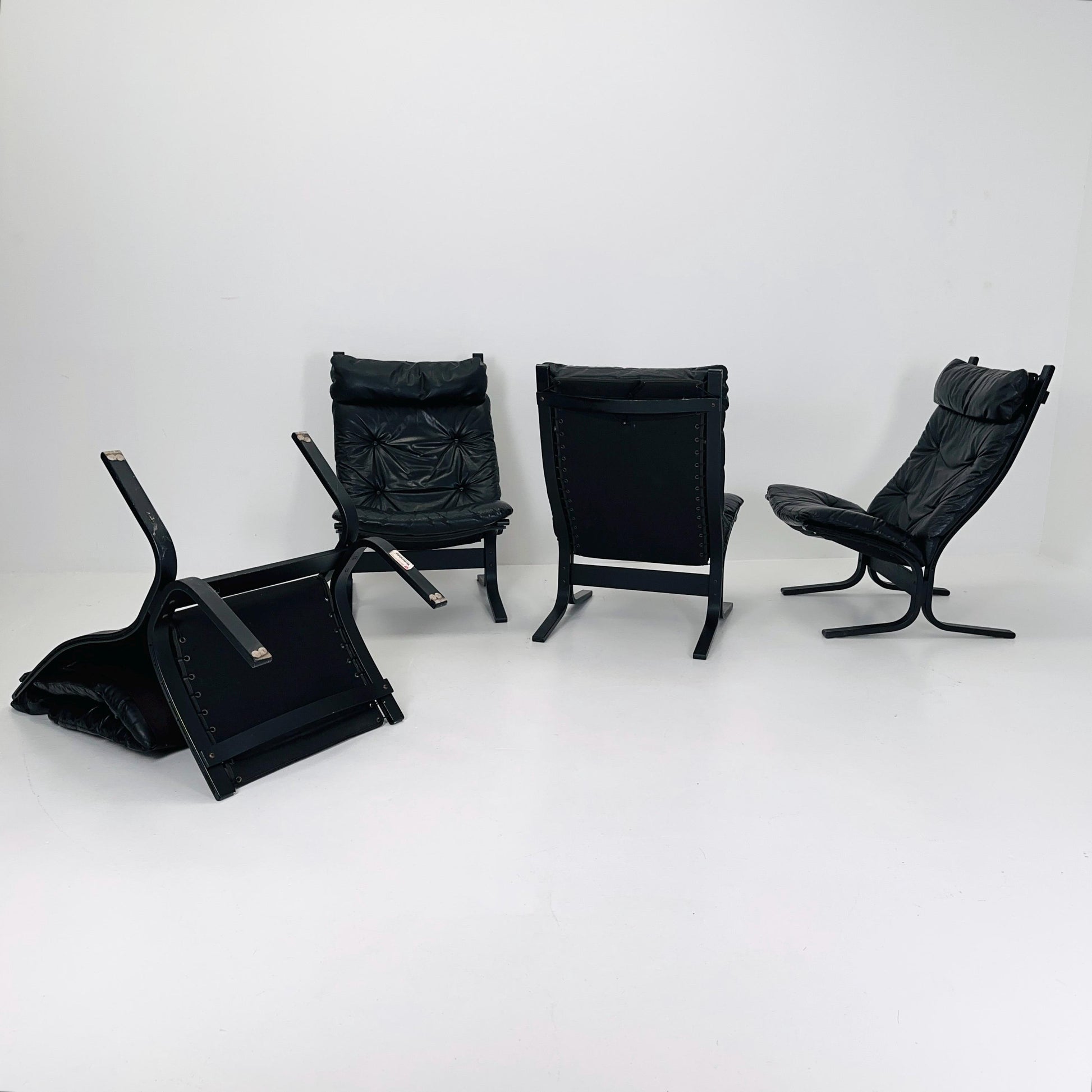 Set of 4 Mid Century “Siesta” lounge chair by Ingmar Relling, Westnofa Furniture, Norway — Full Black Edition, Leather & Wooden Frame, 1960s