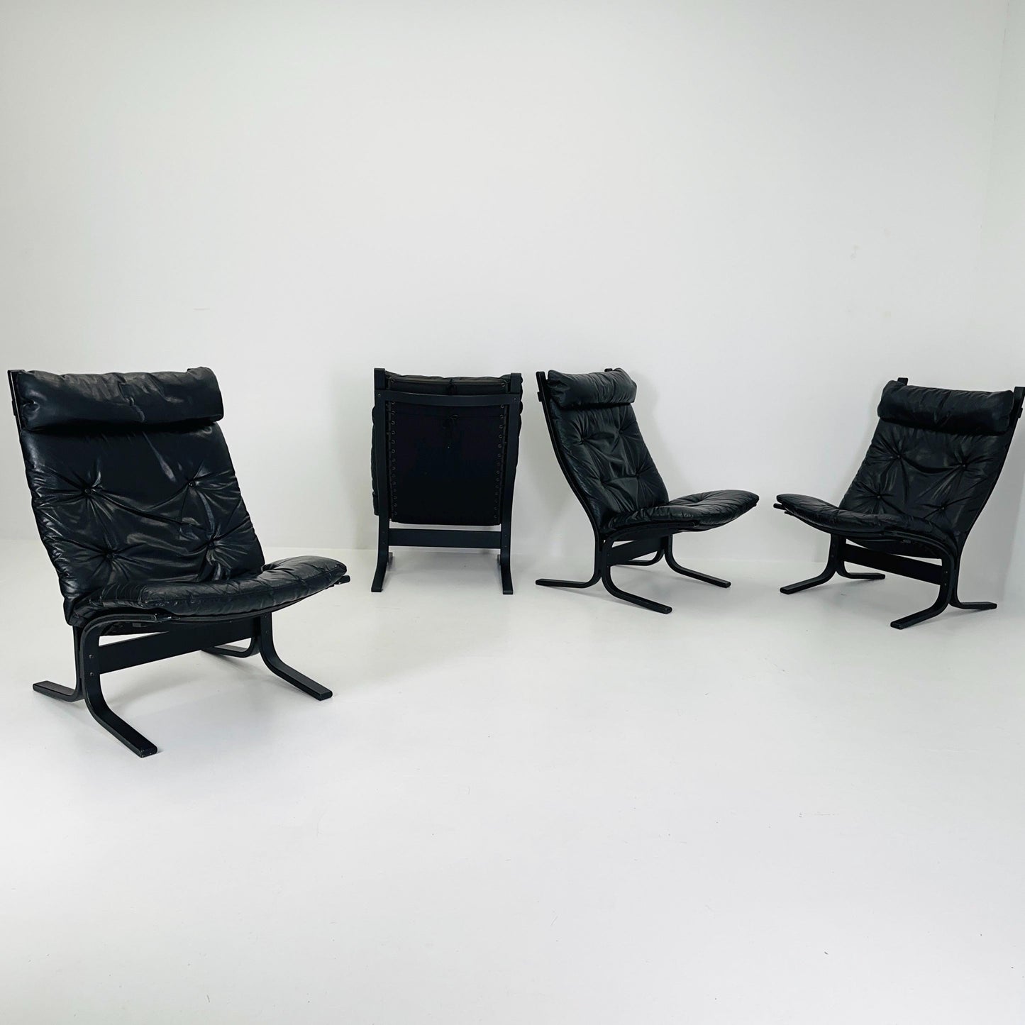 Set of 4 Mid Century “Siesta” lounge chair by Ingmar Relling, Westnofa Furniture, Norway — Full Black Edition, Leather & Wooden Frame, 1960s