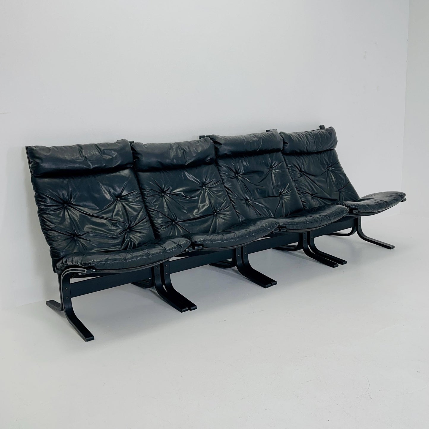 Set of 4 Mid Century “Siesta” lounge chair by Ingmar Relling, Westnofa Furniture, Norway — Full Black Edition, Leather & Wooden Frame, 1960s