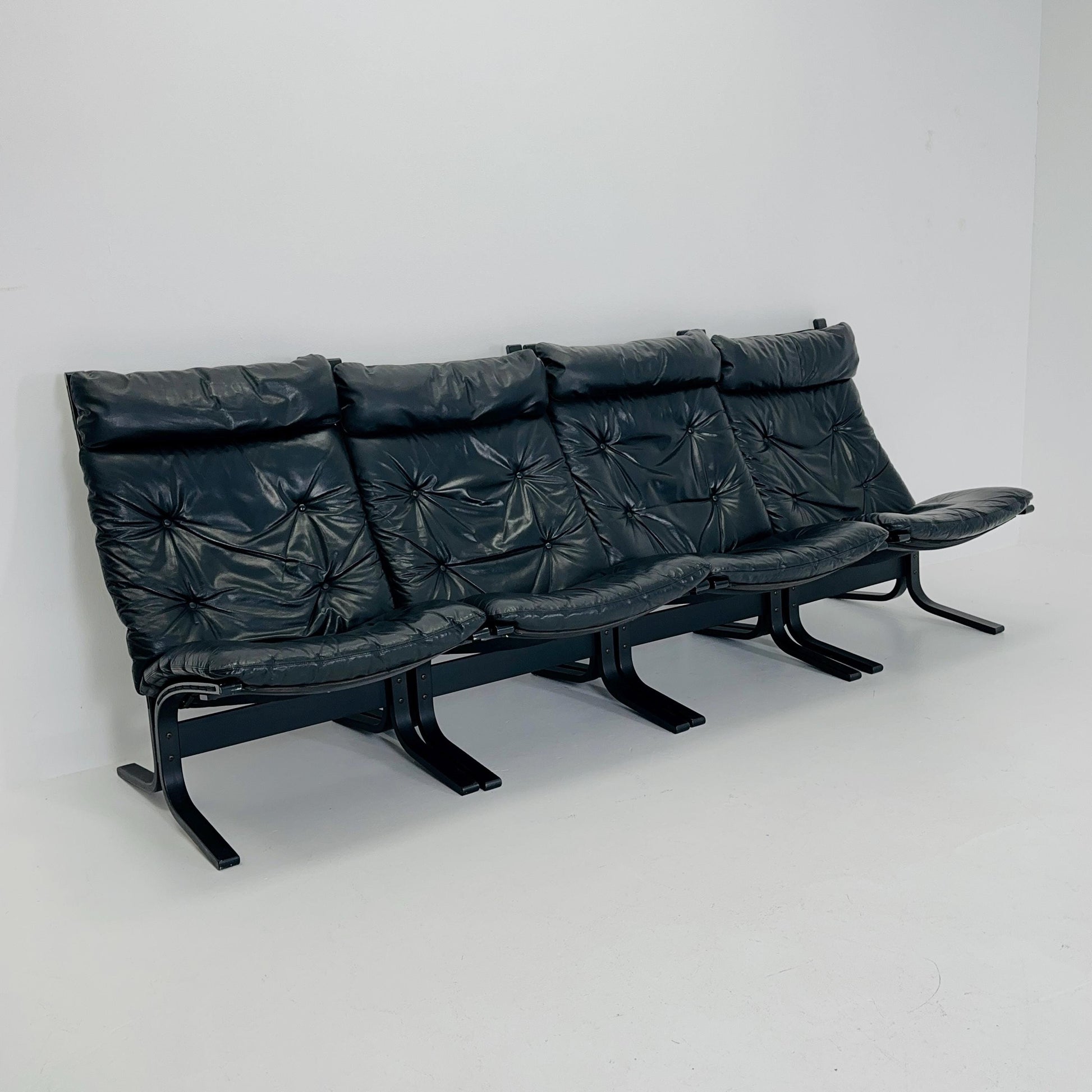 Set of 4 Mid Century “Siesta” lounge chair by Ingmar Relling, Westnofa Furniture, Norway — Full Black Edition, Leather & Wooden Frame, 1960s