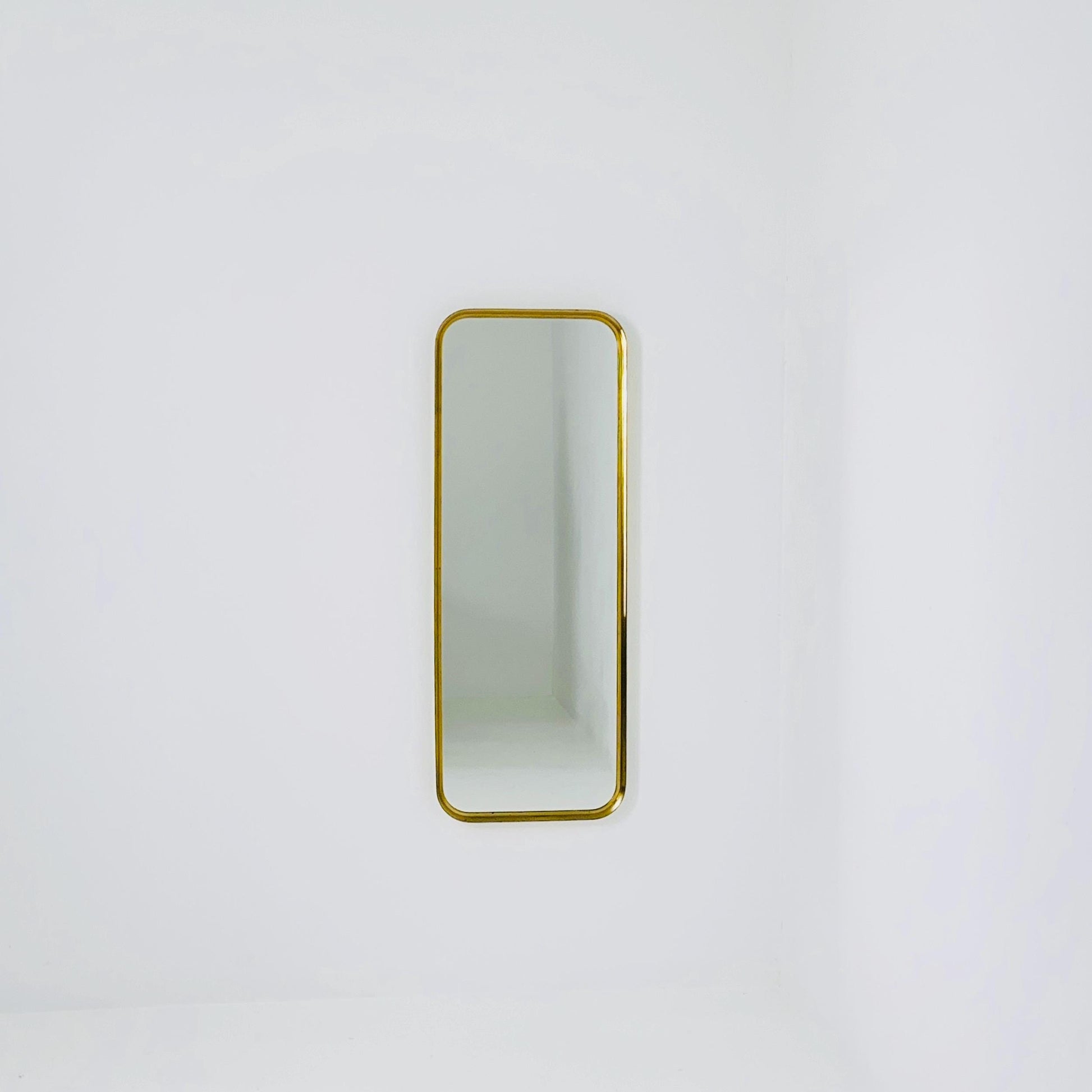 Large Mid-Century Modern wall mirror with brass frame by Münchener Zierspiegel, 1950s