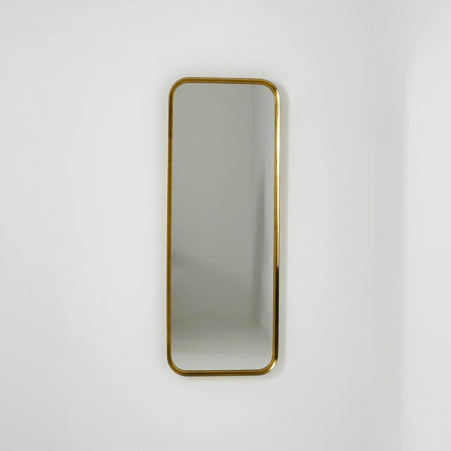 Large Mid-Century Modern wall mirror with brass frame by Münchener Zierspiegel, 1950s