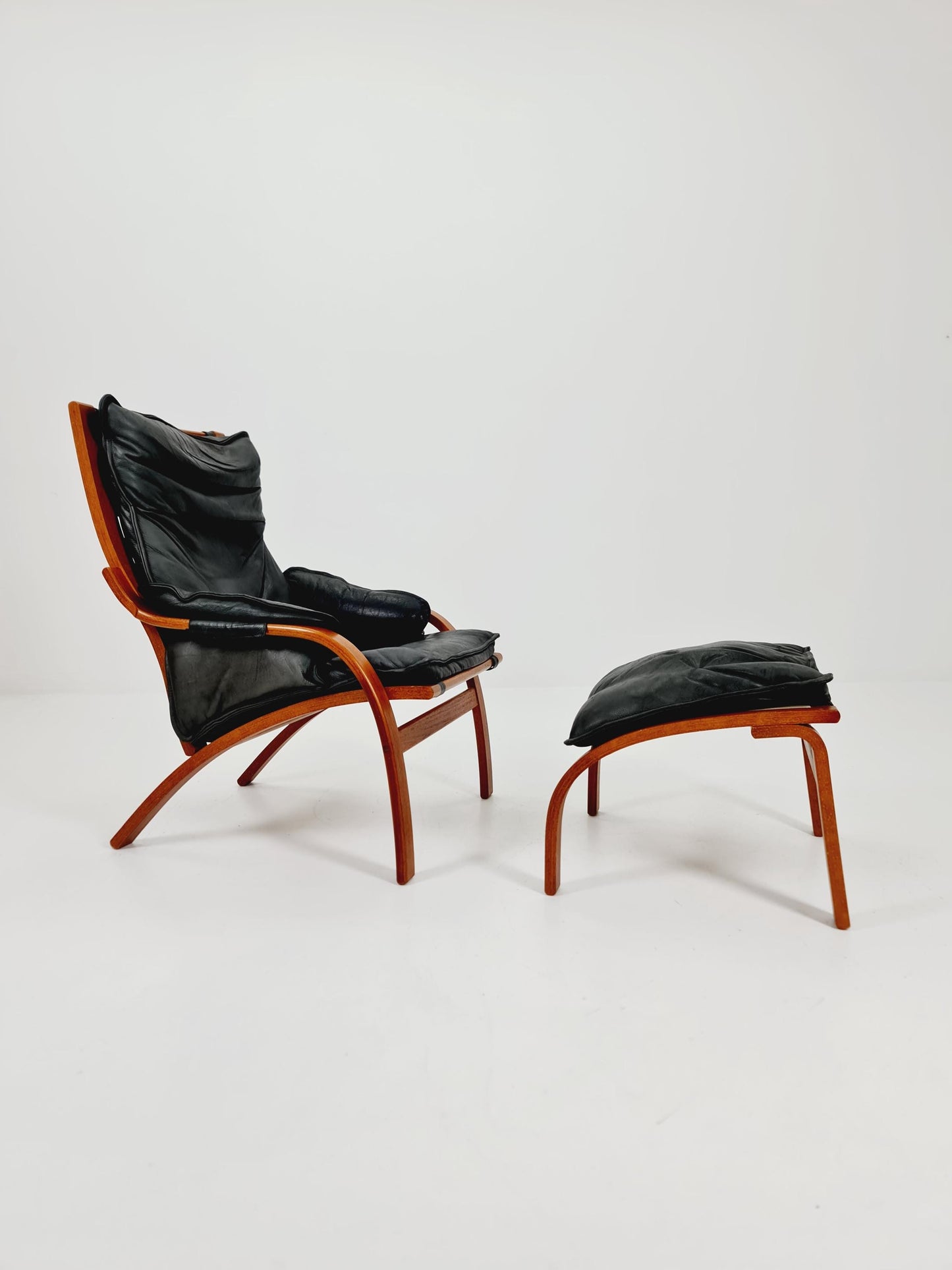 Mid century Armchair and foot stool By Swedese 1960