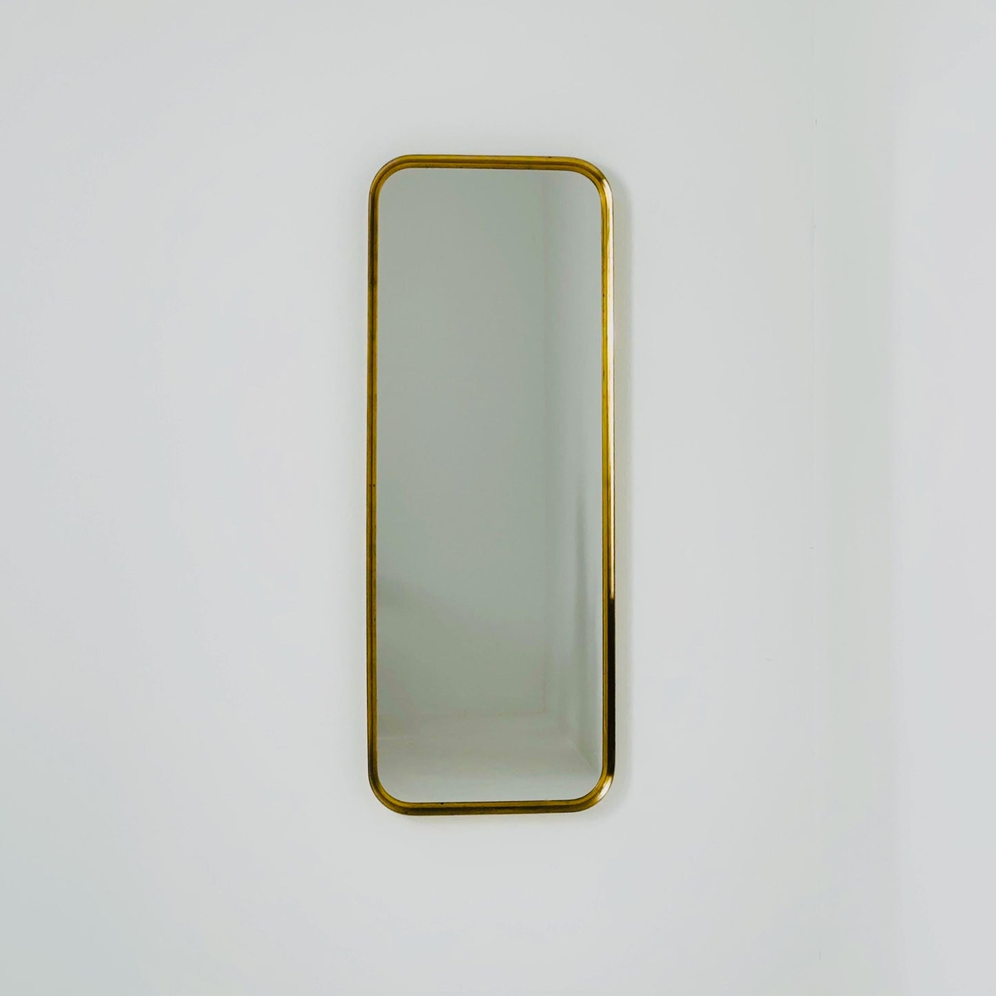 Large Mid-Century Modern wall mirror with brass frame by Münchener Zierspiegel, 1950s