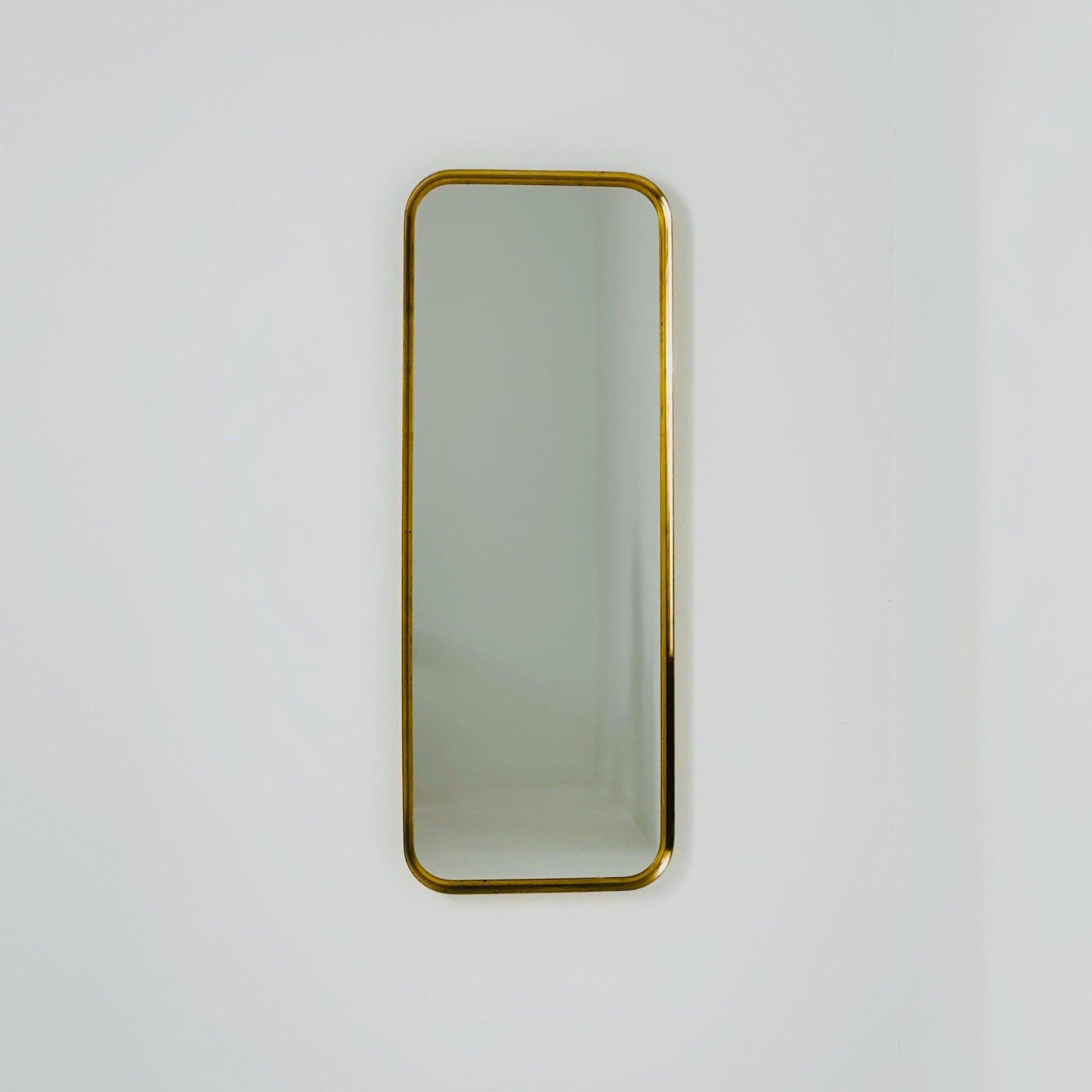 Large Mid-Century Modern wall mirror with brass frame by Münchener Zierspiegel, 1950s