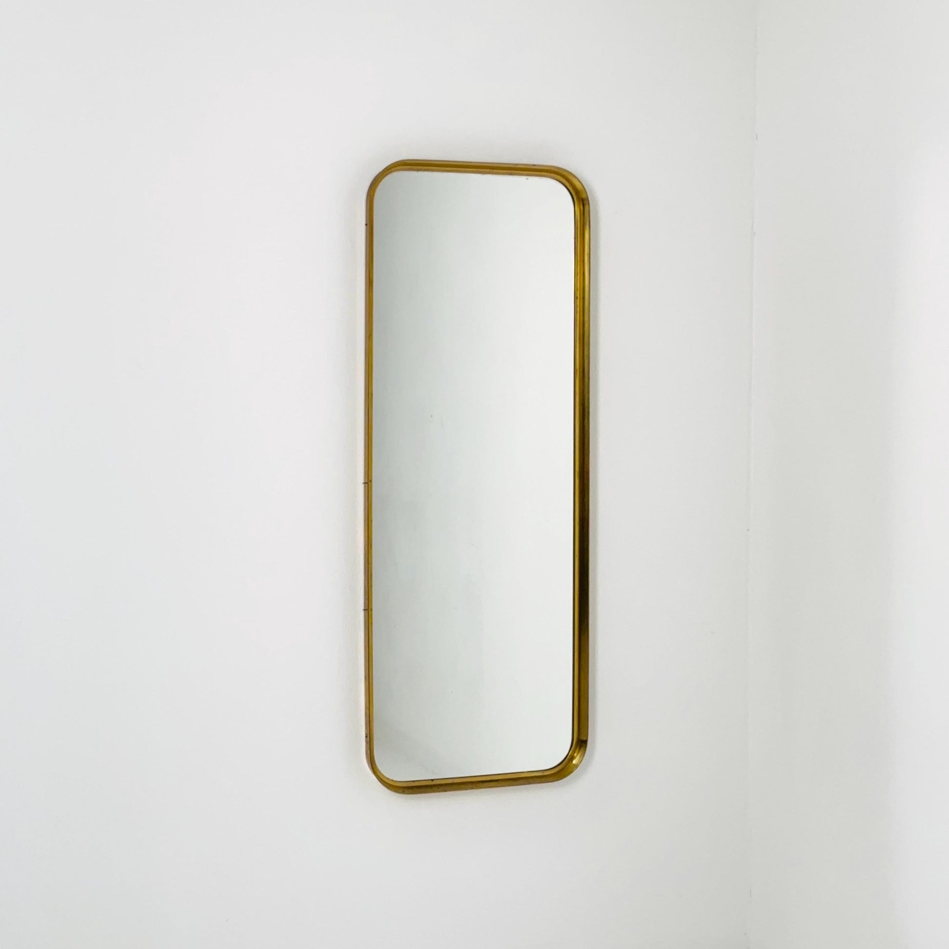 Large Mid-Century Modern wall mirror with brass frame by Münchener Zierspiegel, 1950s