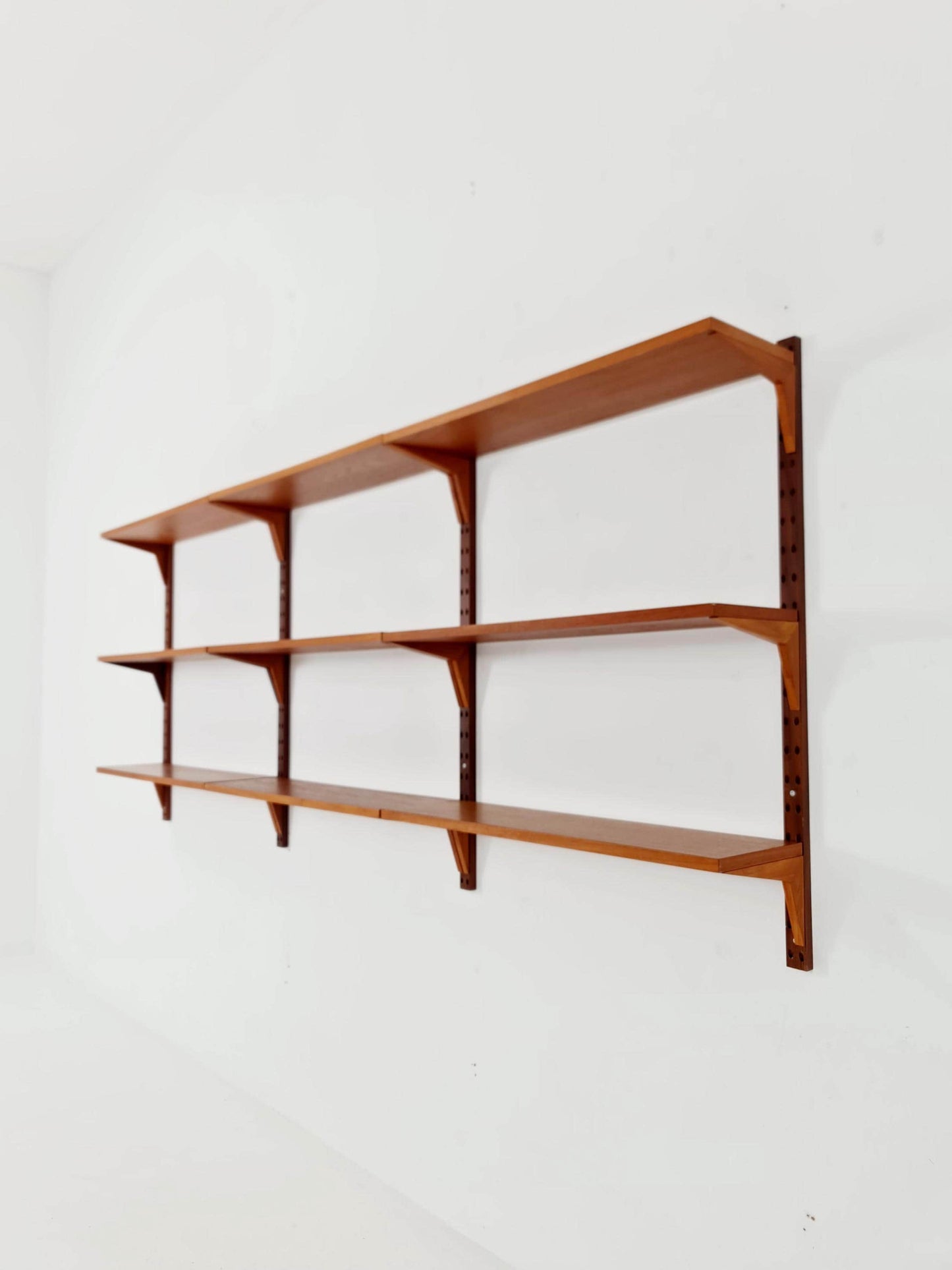 Midcentury Danish teak Wall-Mounted Shelving Unit, by Poul Cadovius, 1960s