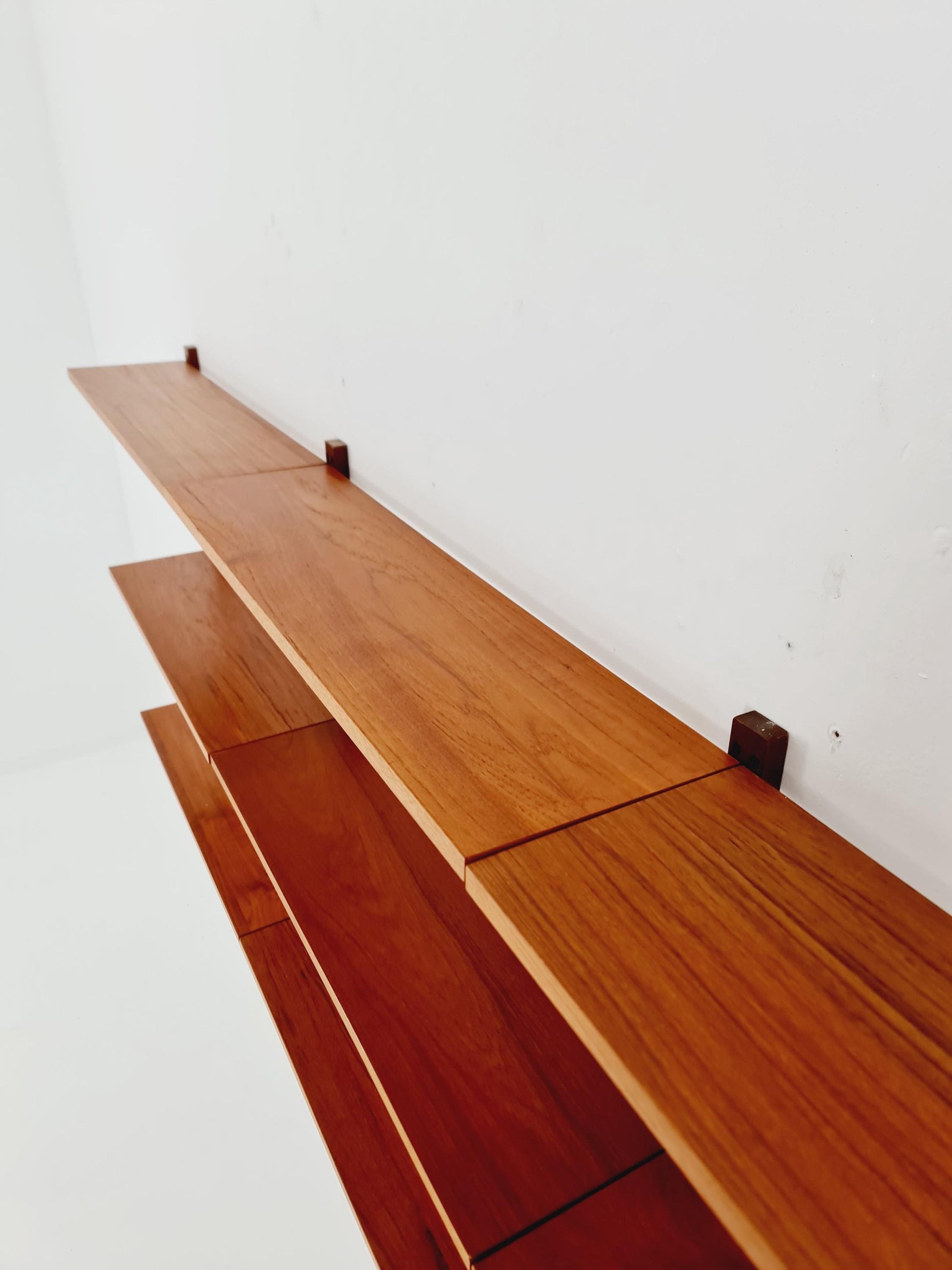 Midcentury Danish teak Wall-Mounted Shelving Unit, by Poul Cadovius, 1960s