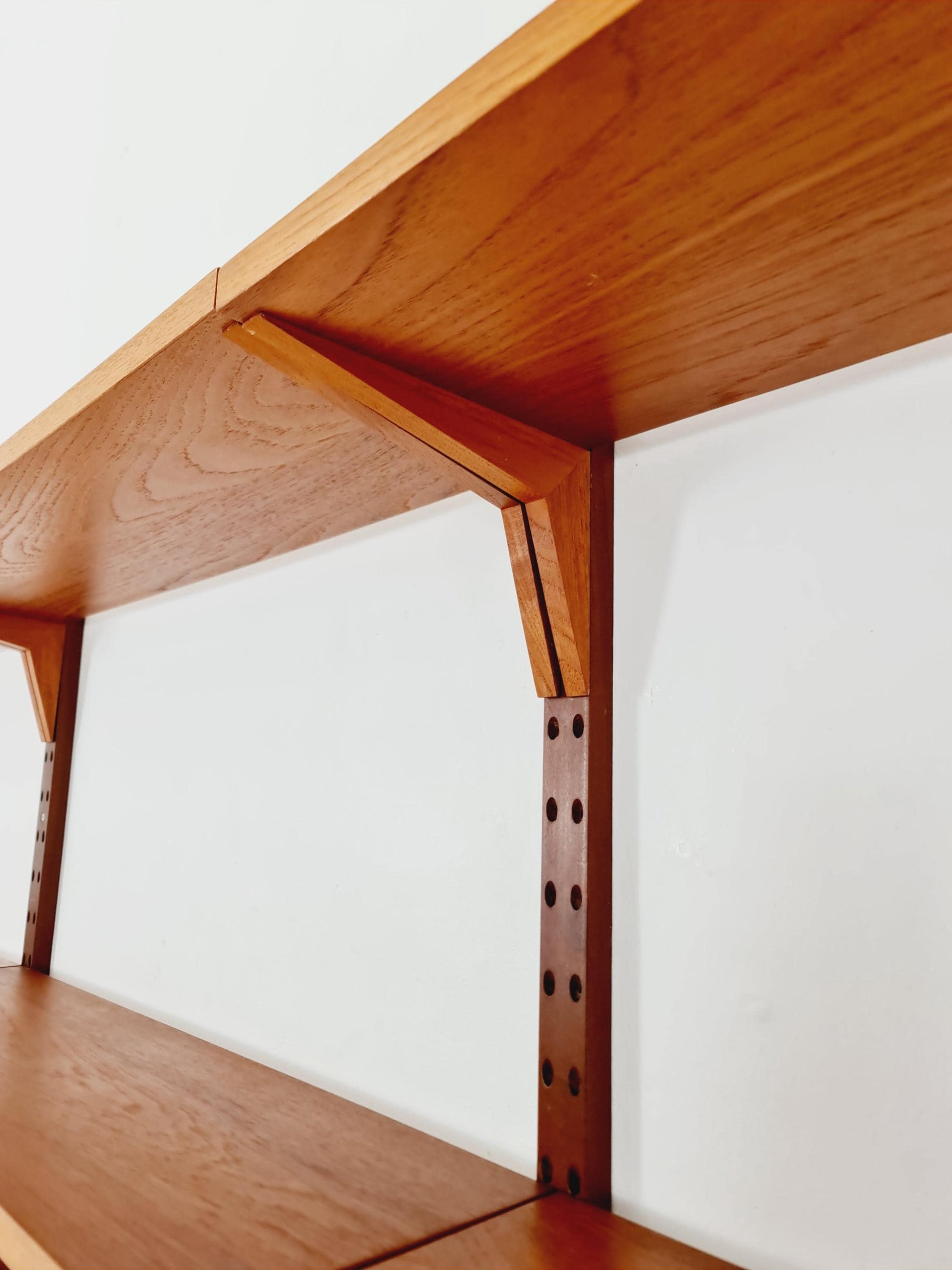 Midcentury Danish teak Wall-Mounted Shelving Unit, by Poul Cadovius, 1960s