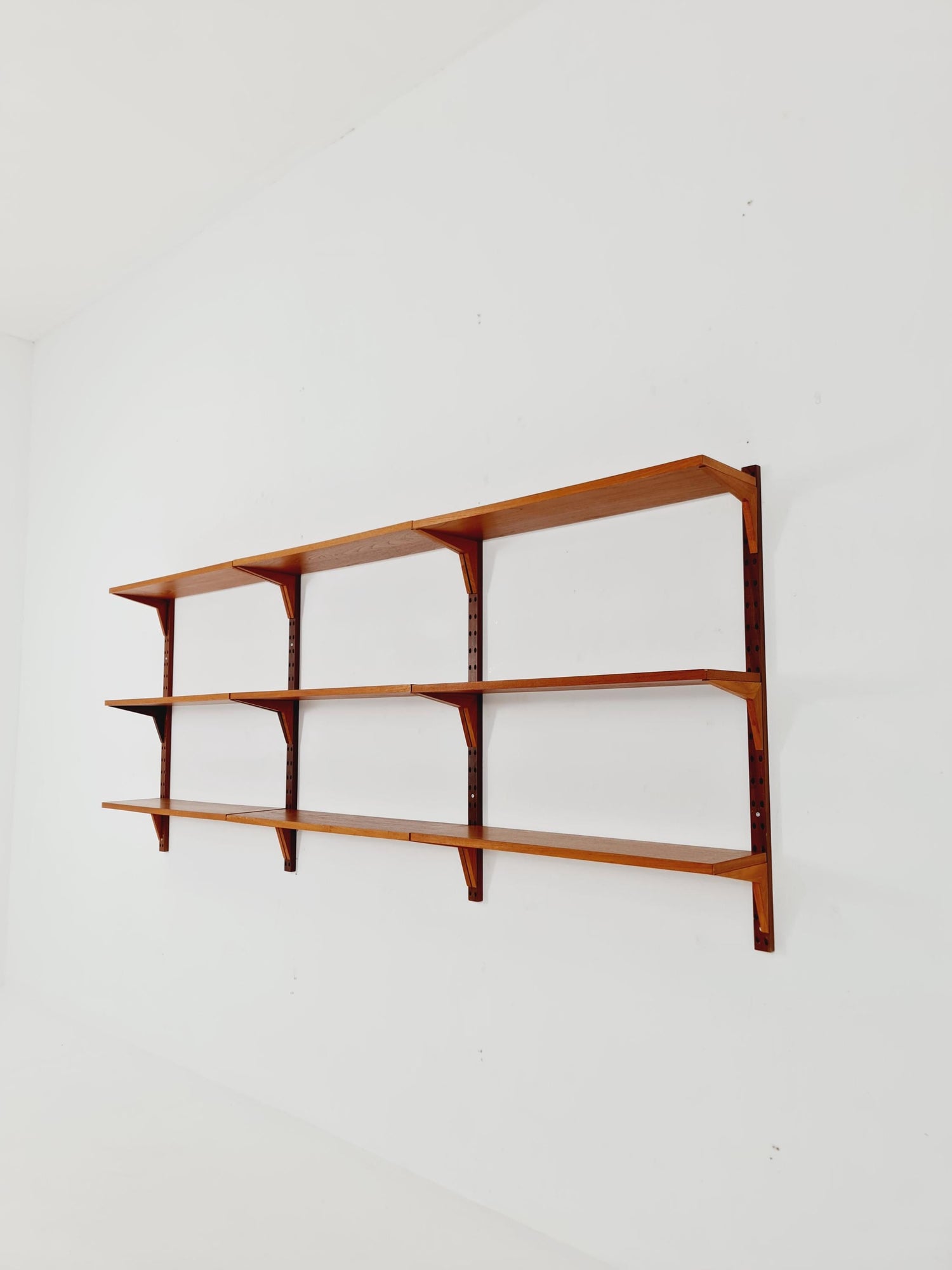 Midcentury Danish teak Wall-Mounted Shelving Unit, by Poul Cadovius, 1960s