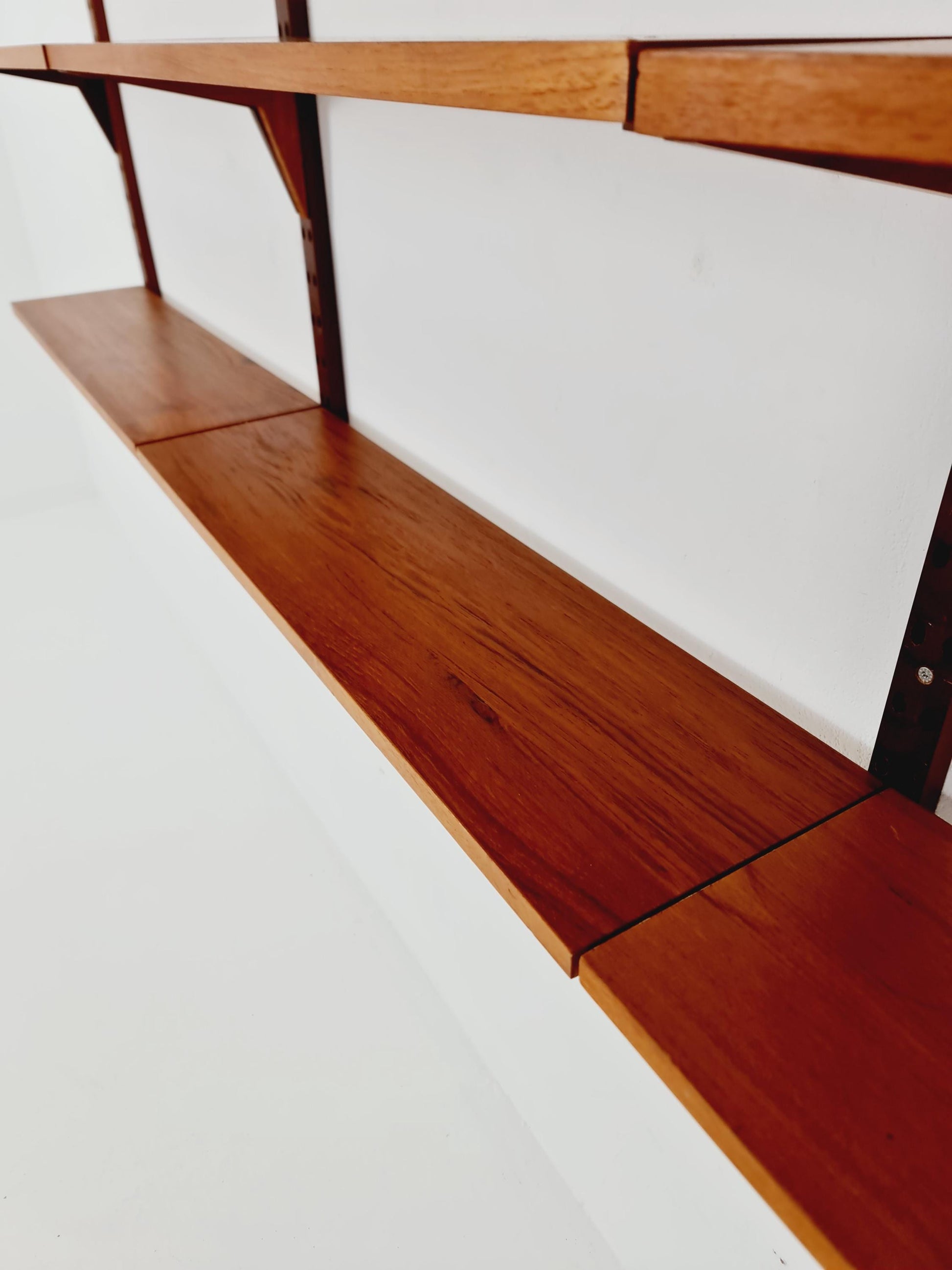 Midcentury Danish teak Wall-Mounted Shelving Unit, by Poul Cadovius, 1960s