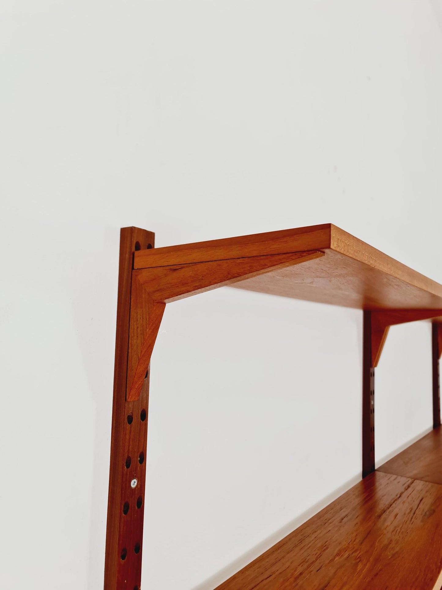 Midcentury Danish teak Wall-Mounted Shelving Unit, by Poul Cadovius, 1960s