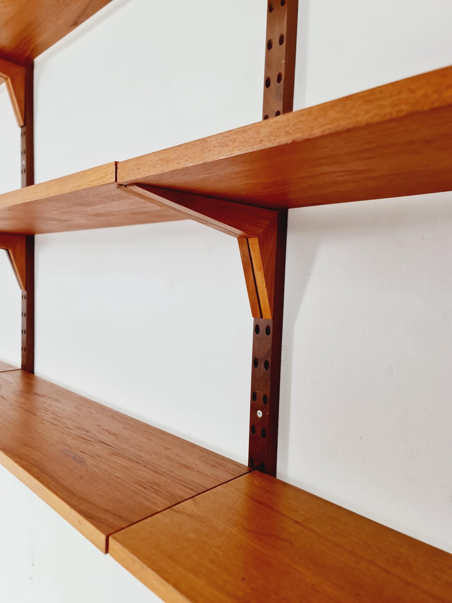 Midcentury Danish teak Wall-Mounted Shelving Unit, by Poul Cadovius, 1960s