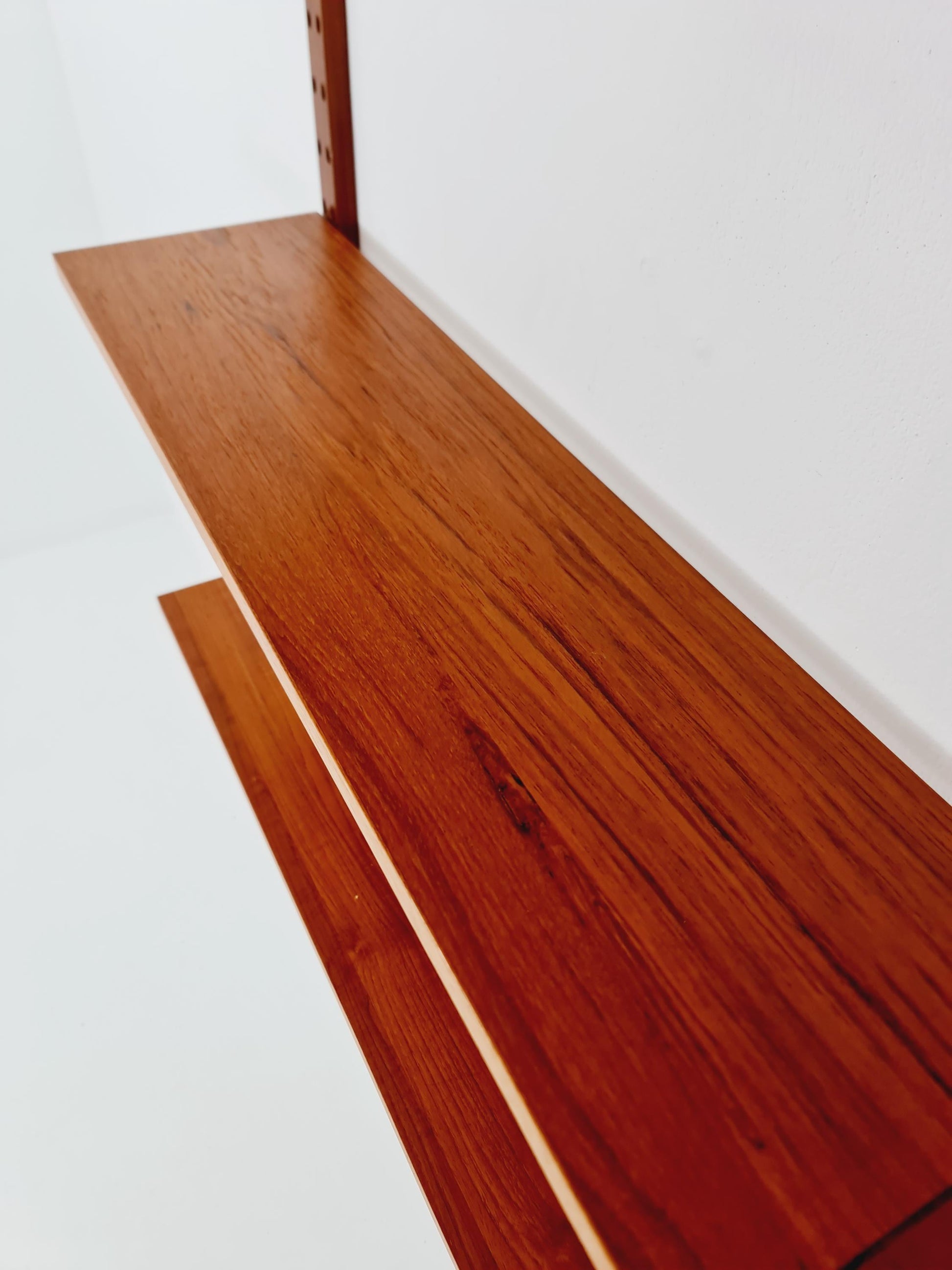 Midcentury Danish teak Wall-Mounted Shelving Unit, by Poul Cadovius, 1960s