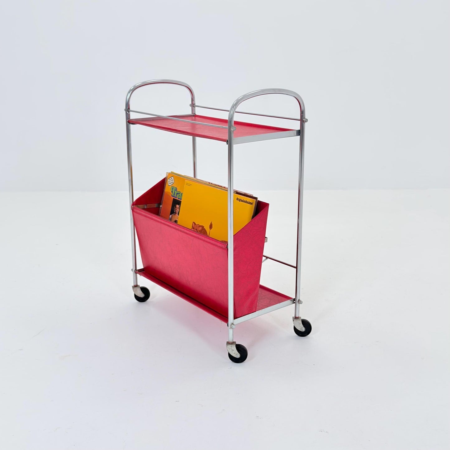 Mid century Bauhaus Rolling magazine holder - bar cart - side table chrome and red vinyl -1980s Germany