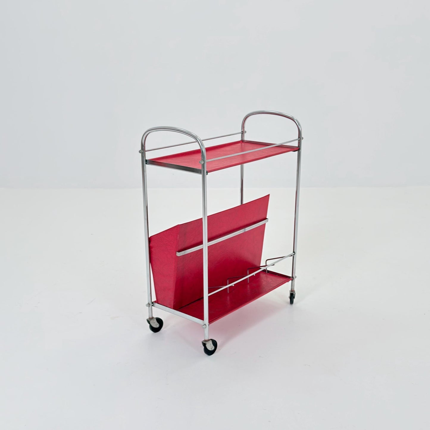 Mid century Bauhaus Rolling magazine holder - bar cart - side table chrome and red vinyl -1980s Germany