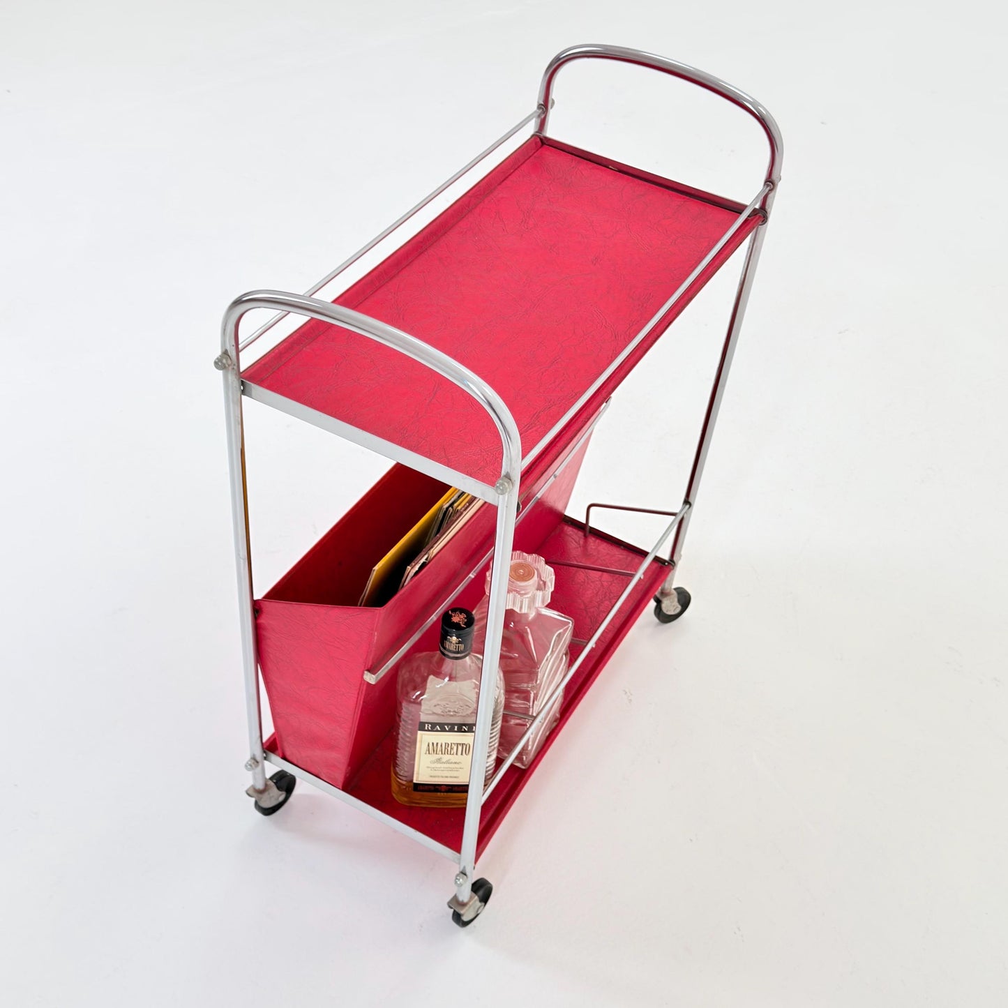 Mid century Bauhaus Rolling magazine holder - bar cart - side table chrome and red vinyl -1980s Germany