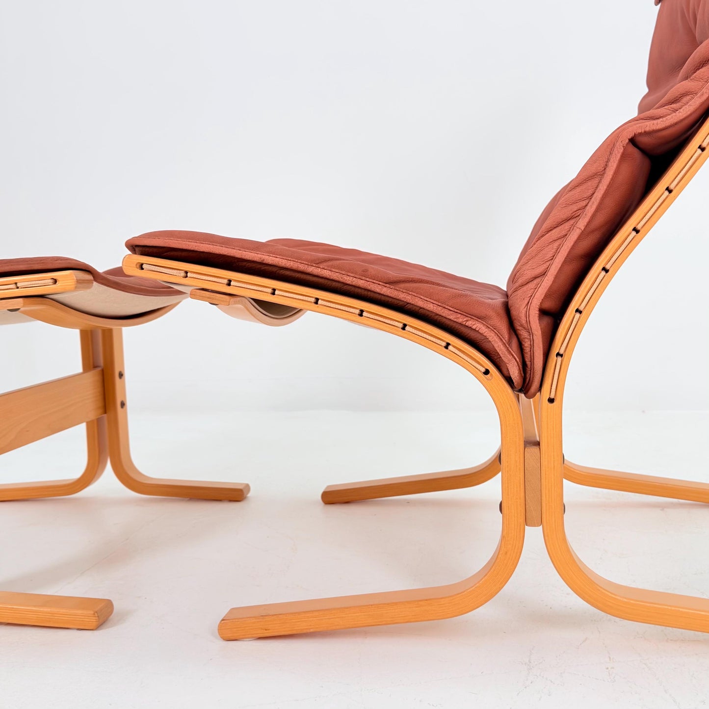 Mid century lounge chair “Siesta” and ottoman by Ingmar Relling, Westnofa Furniture, Norway 1980s