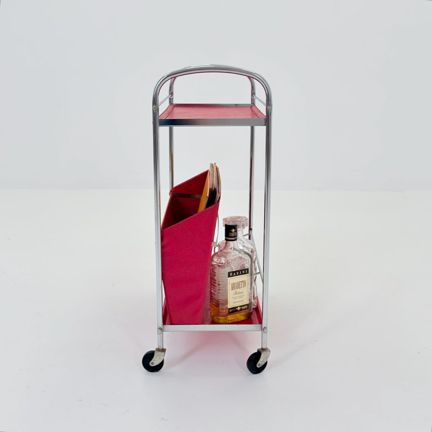 Mid century Bauhaus Rolling magazine holder - bar cart - side table chrome and red vinyl -1980s Germany