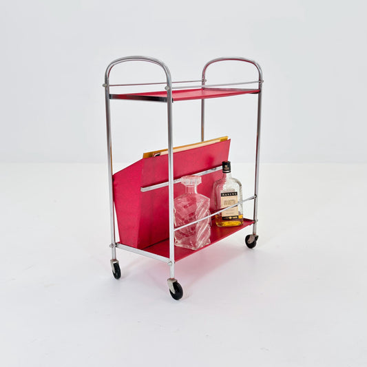 Mid century Bauhaus Rolling magazine holder - bar cart - side table chrome and red vinyl -1980s Germany
