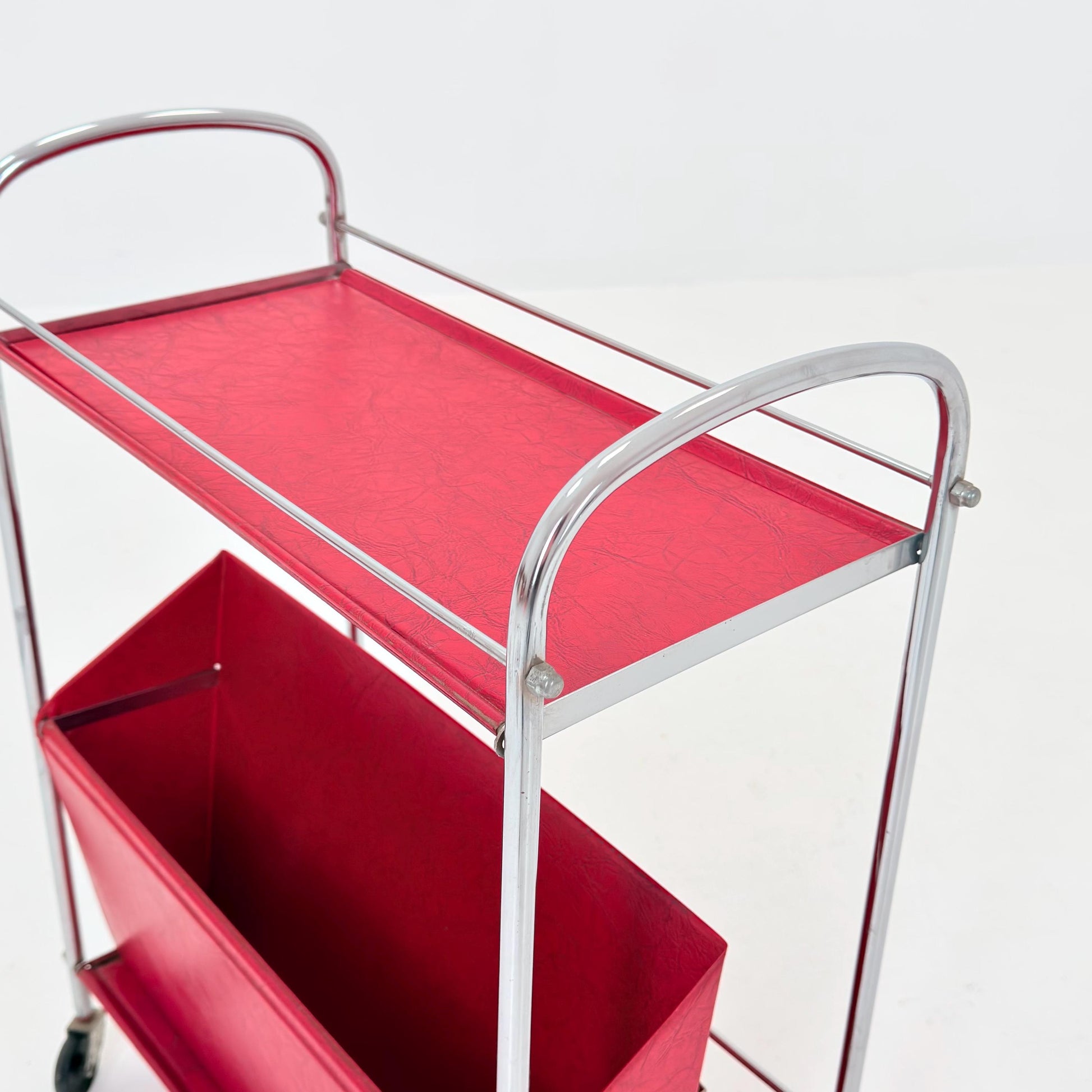 Mid century Bauhaus Rolling magazine holder - bar cart - side table chrome and red vinyl -1980s Germany