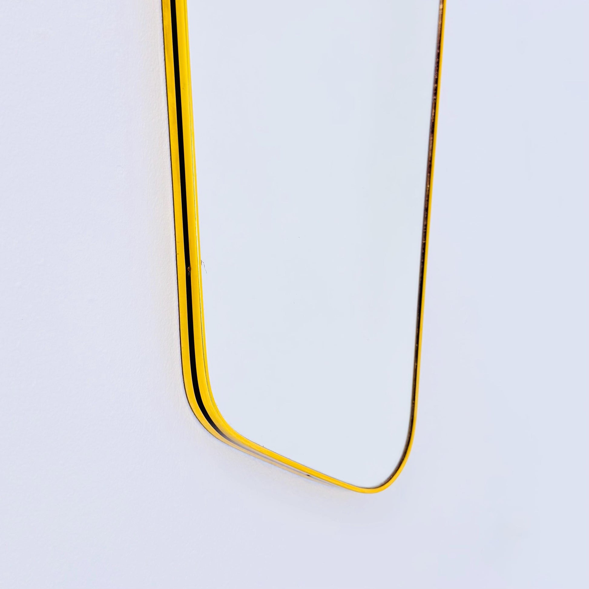 Mid century wall mirror brass framed with black edging 1950s